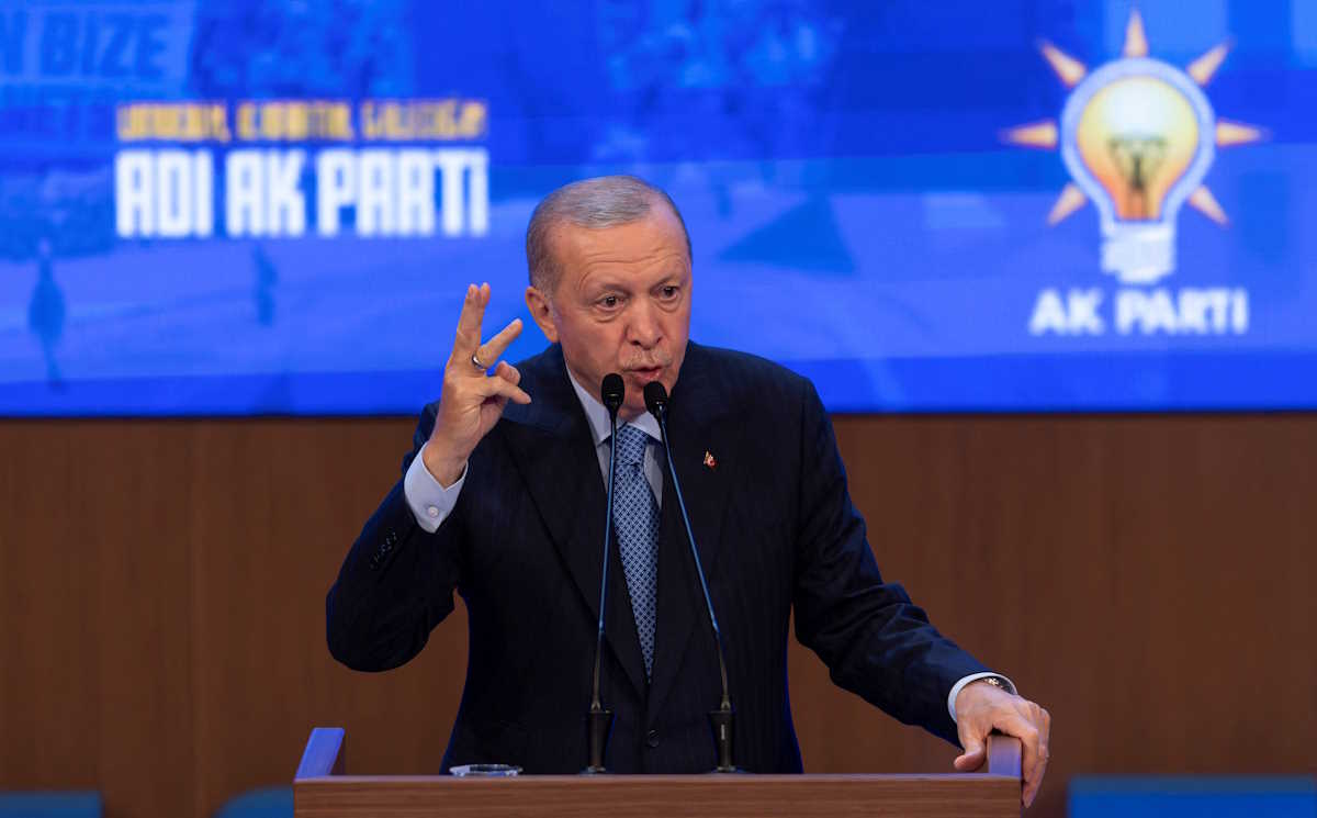Turkish President Tayyip Erdogan addresses his supporters during a meeting in Ankara, Turkey, August 14, 2024. REUTERS