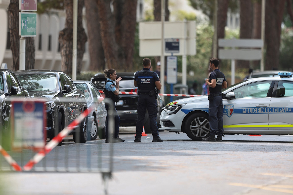 French law enforcement officers stand guard after cars were set on fire in front of the city's synagogue, in La Grande-Motte, France, August 24, 2024. REUTERS