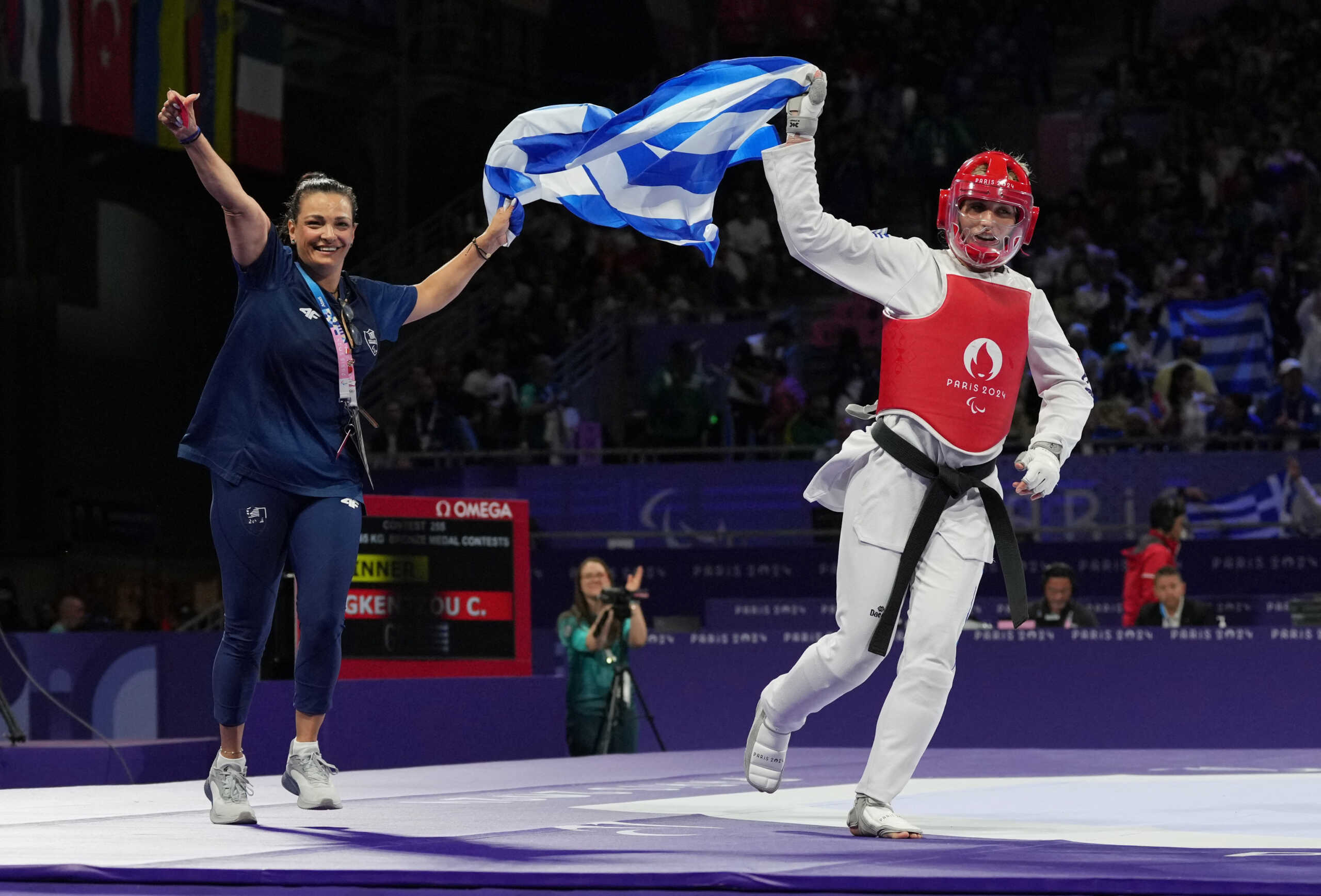 Paris 2024 Paralympics - Taekwondo - Women K44 -65kg Bronze Medal Contests - Grand Palais, Paris, France - August 30, 2024 Christina Gkentzou of Greece celebrates after winning against Yinan Yao of China REUTERS