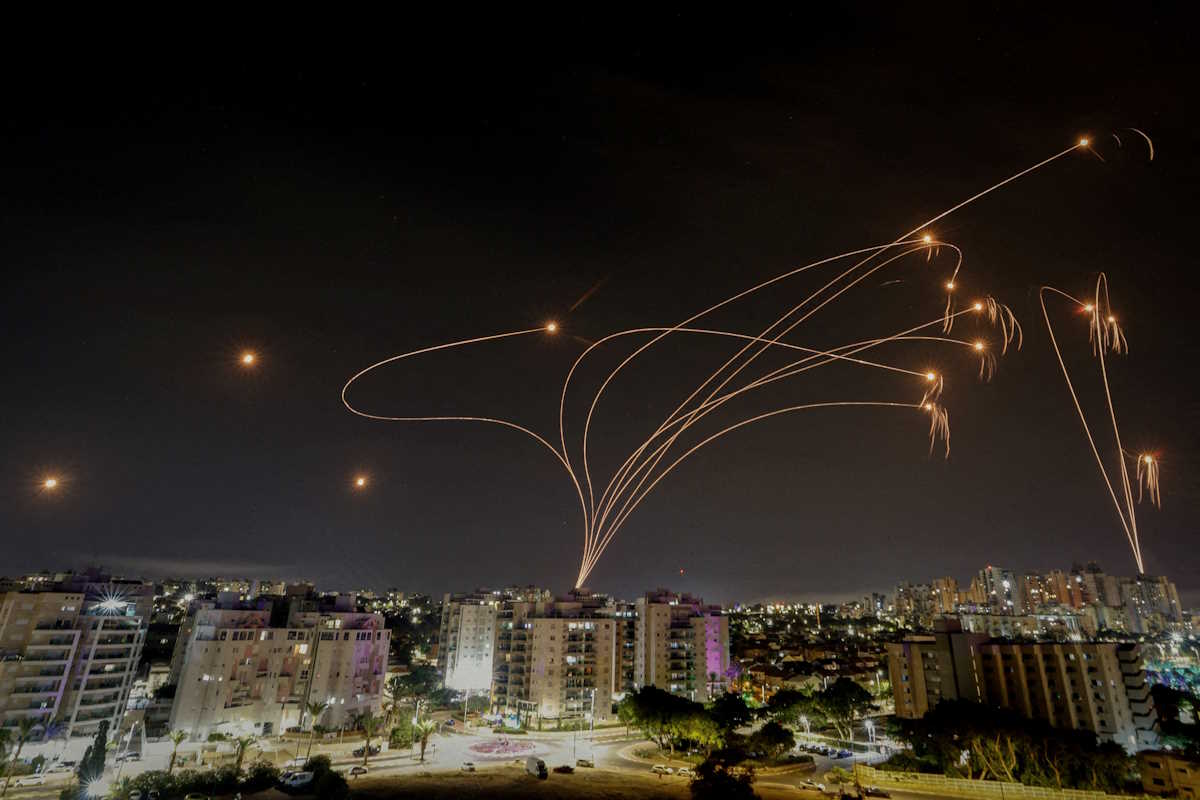 FILE PHOTO: Israel's Iron Dome anti-missile system intercepts rockets launched from the Gaza Strip, as seen from the city of Ashkelon, Israel, October 9, 2023. REUTERS