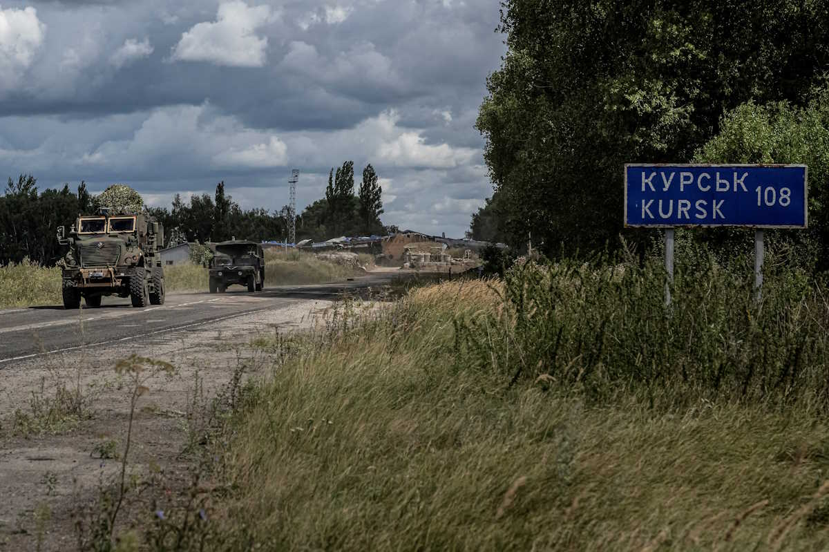 FILE PHOTO: Ukrainian servicemen ride military vehicles from a crossing point at the border with Russia, amid Russia's attack on Ukraine, in Sumy region, Ukraine August 13, 2024. REUTERS