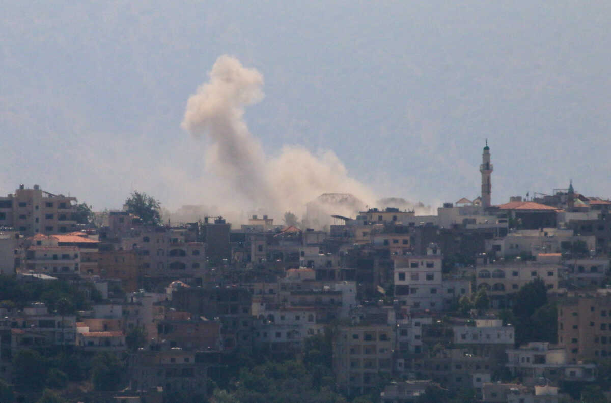 Smoke rises from the southern Lebanese town of Khiam, amid ongoing cross-border hostilities between Hezbollah and Israeli forces, as pictured from Marjayoun, near the border with Israel, August 9, 2024. REUTERS