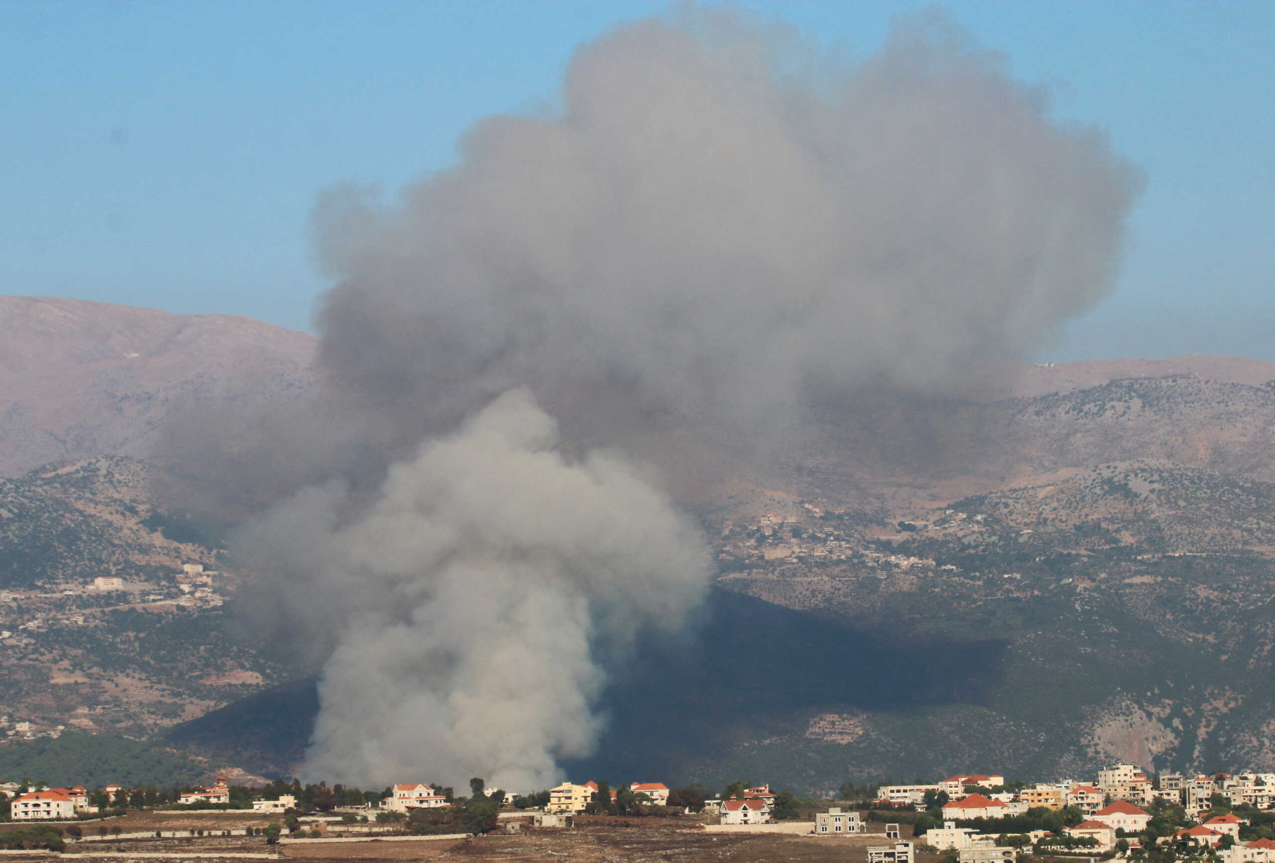 Smoke rises east of Khiam, amid cross-border hostilities between Hezbollah and Israeli forces, as pictured from Marjayoun, near the border with Israel, Lebanon August 9, 2024. REUTERS