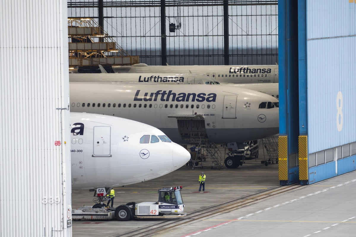 epa11215800 Lufthansa planes are seen park in a hangar, at Frankfurt Airport, in Frankfurt am Main, Germany, 12 March 2024. The UFO cabin crew union has called on its members to strike, to press their demands for better wages. According to Lufthansa, 100,000 passengers should be affected by a two day strike in Frankfurt and Munich airport.  EPA