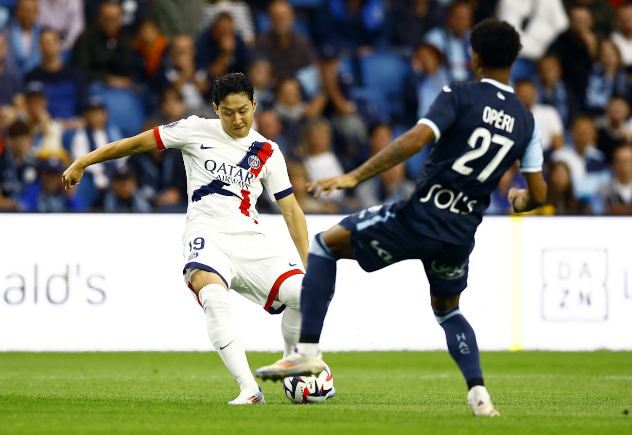 Soccer Football - Ligue 1 - Le Havre v Paris St Germain - Stade Oceane, Le Havre, France - August 16, 2024  Paris St Germain's Lee Kang-in scores their first goal REUTERS