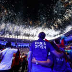 Paris 2024 Olympics - Ceremonies - Paris 2024 Closing Ceremony - Stade de France, Saint-Denis, France - August 12, 2024. athletes watch as fireworks explode during the closing ceremony REUTERS