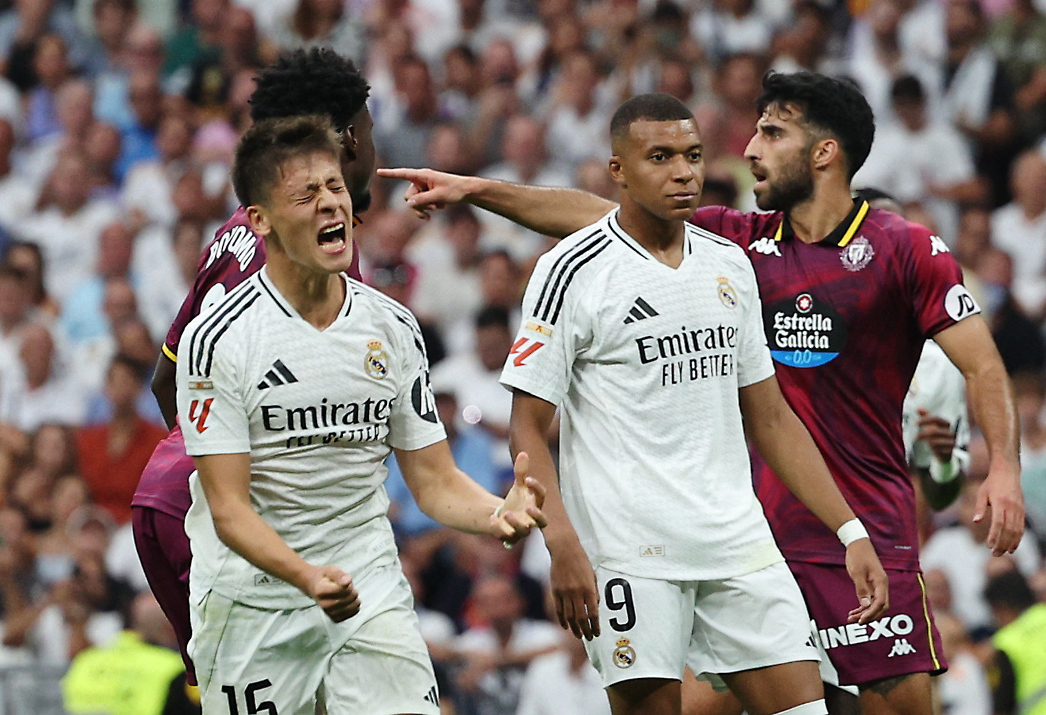 Soccer Football - LaLiga - Real Madrid v Real Valladolid - Santiago Bernabeu, Madrid, Spain - August 25, 2024 Real Madrid's Arda Guler and Kylian Mbappe react REUTERS