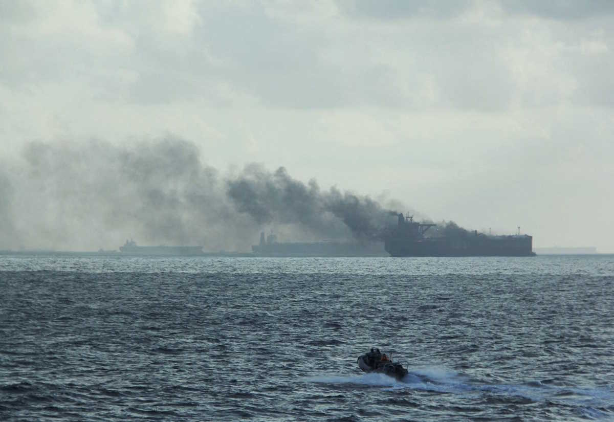 FILE PHOTO: A handout image shows the RSS Supreme's rigid-hulled inflatable boat in the vicinity of the burning vessels following a fire on two oil tankers about 55 km (34 miles) northeast of the Singaporean island of Pedra Branca, July 19, 2024. Republic of Singapore Navy