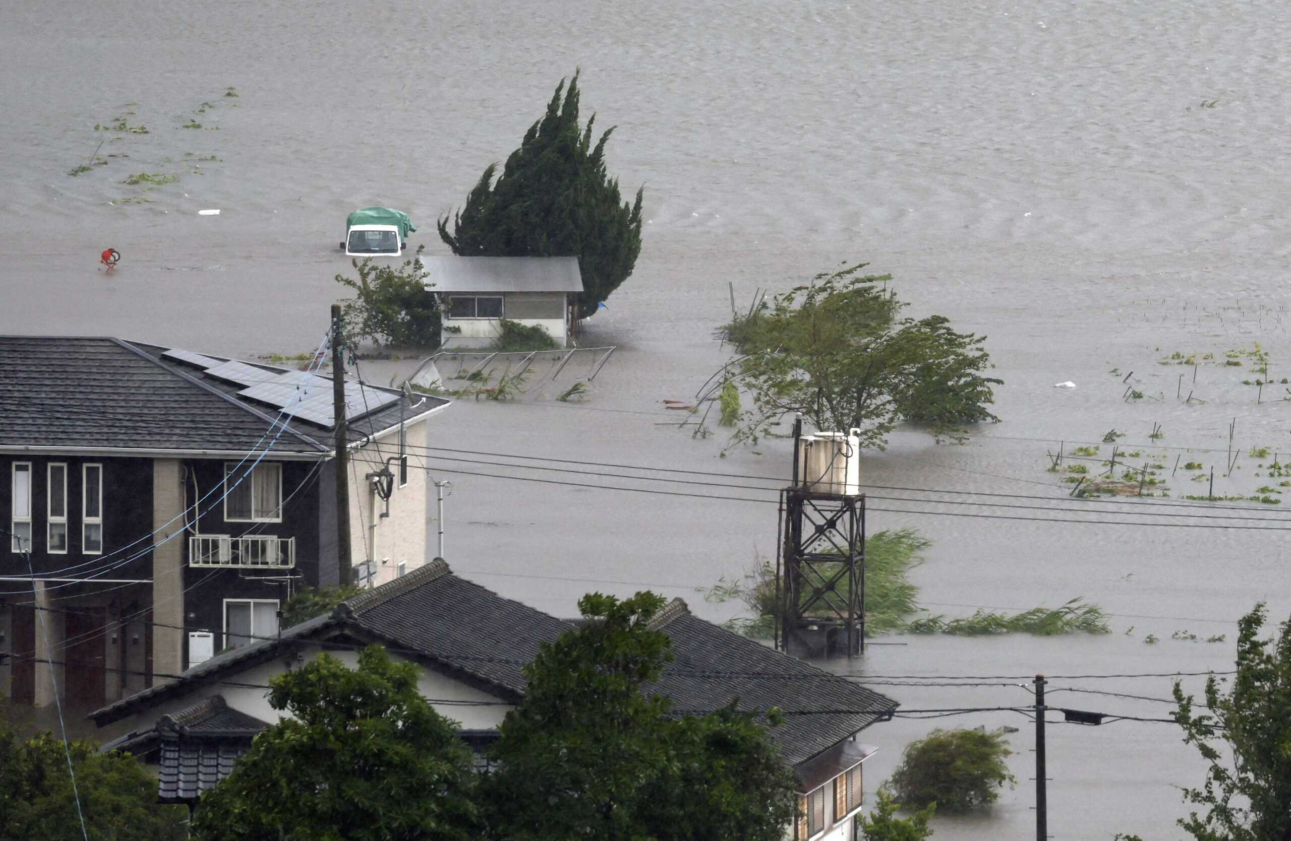 A farmland is submerged due to floods caused by heavy rains from Typhoon Shanshan in Yufu, Oita Prefecture, southwestern Japan, August 29, 2024, in this photo taken by Kyodo. Mandatory credit Kyodo