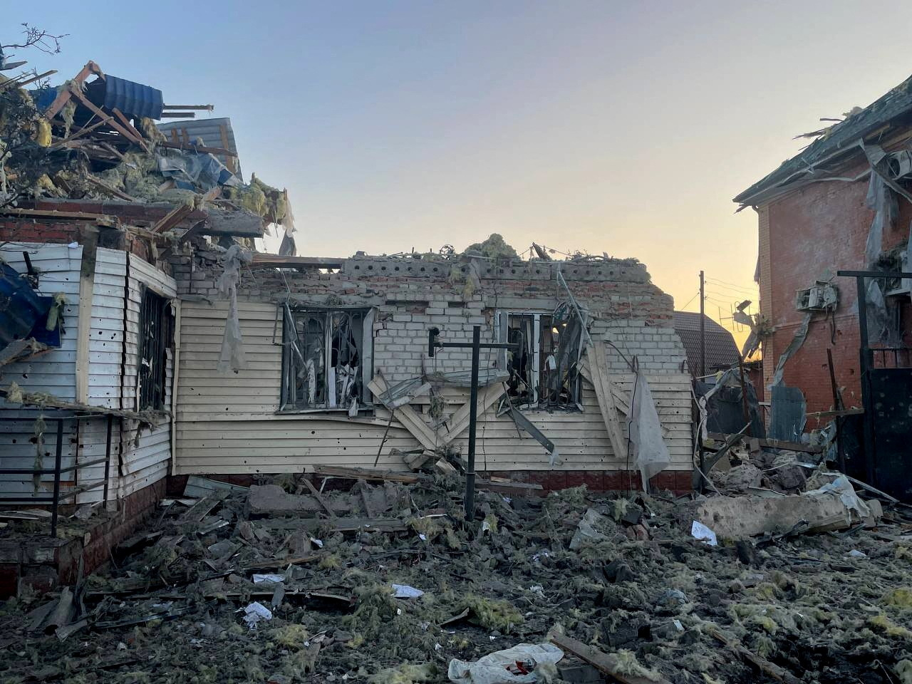 A view shows a damaged house following what local authorities called a Ukrainian military strike, in the course of the Russia-Ukraine conflict in the town of Sudzha in the Kursk Region, Russia, in this handout image released August 6, 2024. Acting Governor of Kursk Region Alexei Smirnov via Telegram