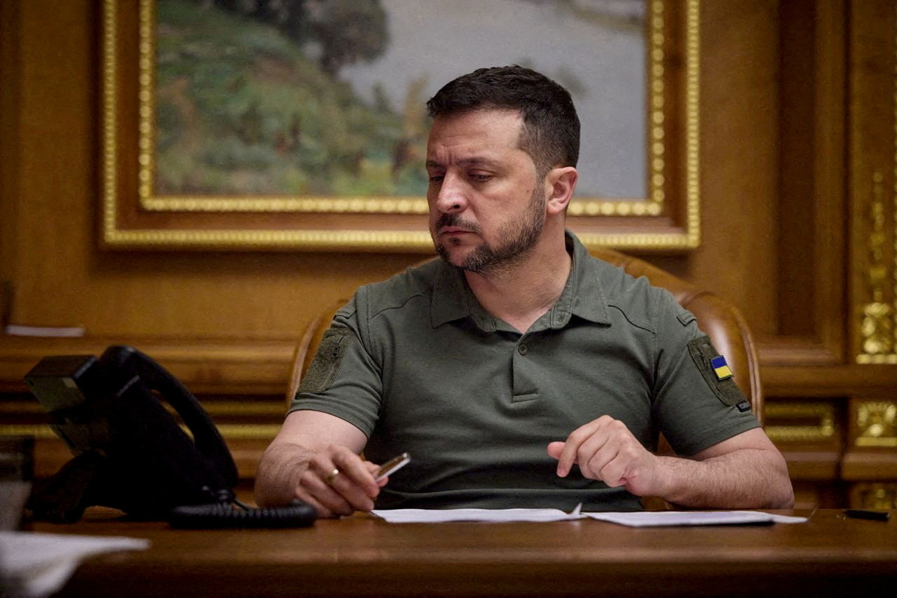 FILE PHOTO: Ukrainian President Volodymyr Zelenskiy holds a phone conversation, in Kyiv, Ukraine April 26, 2023. Ukrainian Presidential Press Service