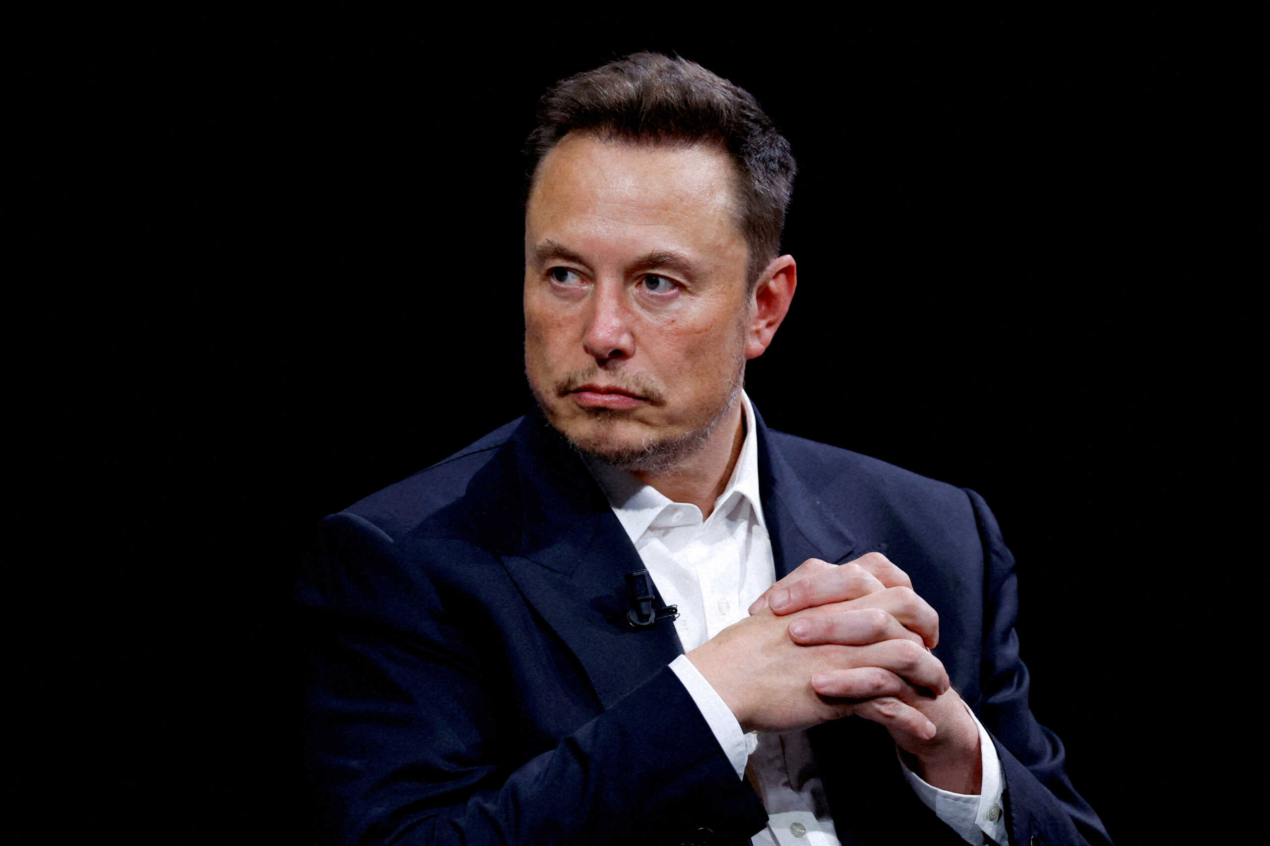 FILE PHOTO: Elon Musk, CEO of SpaceX and Tesla and owner of X, formerly known as Twitter, attends the Viva Technology conference dedicated to innovation and startups at the Porte de Versailles exhibition centre in Paris, France, June 16, 2023. REUTERS