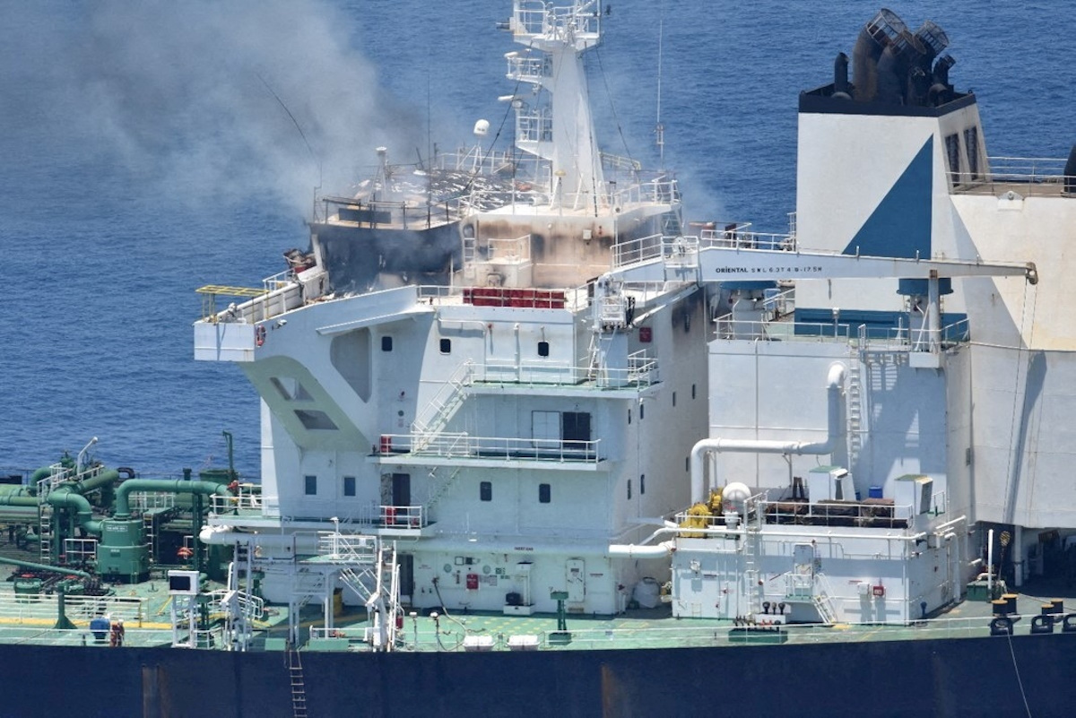 FILE PHOTO: Smoke rises from the Greek-flagged oil tanker Sounion, which has been on fire since August 23, on the Red Sea, August 25, 2024. Yemen's Houthis said they attacked the Sounion in the Red Sea. EUNAVFOR ASPIDES