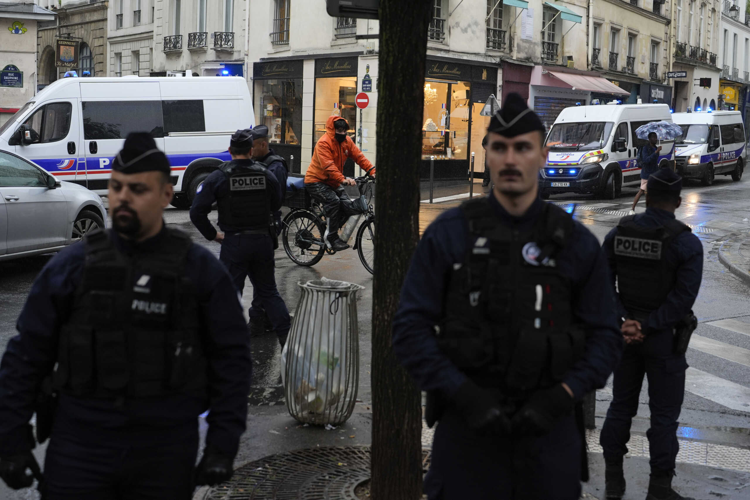 Police investigate activity they deem suspicious near the Seine River, during the 2024 Summer Olympics, Saturday, July 27, 2024, in Paris, France. (AP Photo