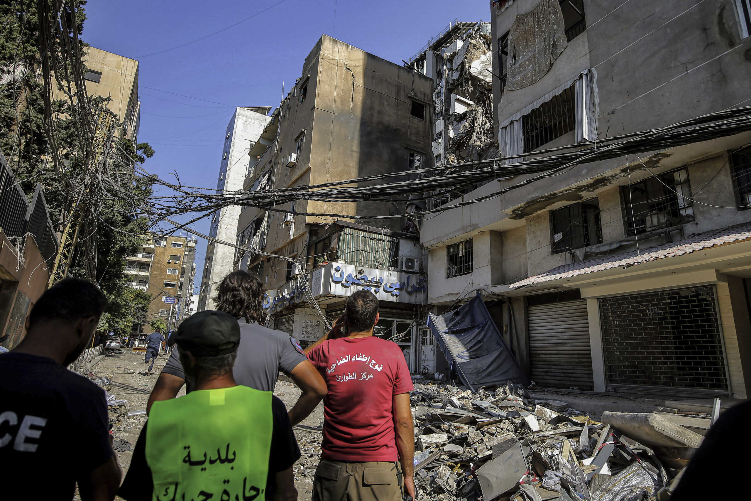 31 July 2024, Lebanon, Beirut: Civil defence workers inspect destruction in buildings that were targeted by an Israeli drone in Beirut's southern suburb. 4 people were killed and wounding more than 70 people. The Israeli military said Tuesday it has carried out a "targeted attack" on a commander of the pro-Iranian Hezbollah militia in Beirut. The explosion occurred three days after a deadly rocket attack on the Israeli-occupied Golan Heights. Photo by: Marwan Naamani