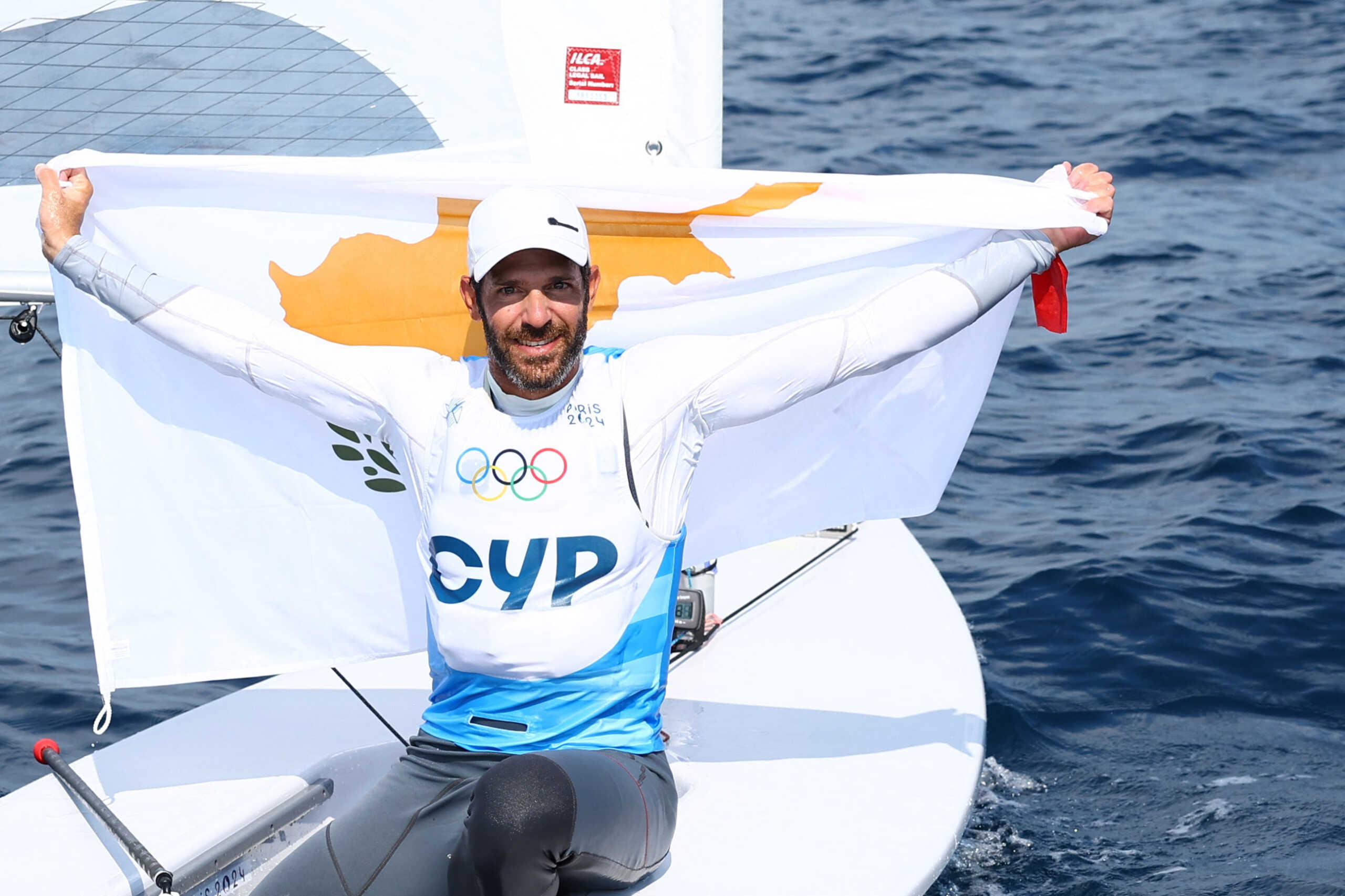Paris 2024 Olympics - Sailing - Men's Dinghy Medal Race - Marseille Marina, Marseille, France - August 07, 2024.  Pavlos Kontides of Cyprus celebrates after winning silver. REUTERS