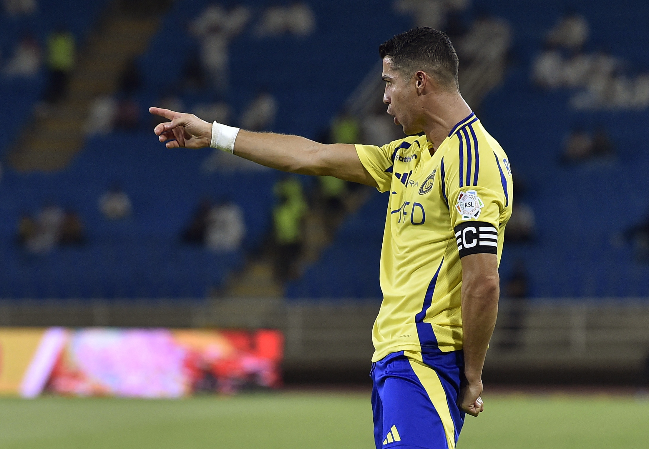 Soccer Football - Saudi Pro League - Al Fayah v Al Nassr - King Abdullah Sports City Stadium, Buraidah, Saudi Arabia - August 27, 2024 Al Nassr's Cristiano Ronaldo celebrates scoring their second goal REUTERS