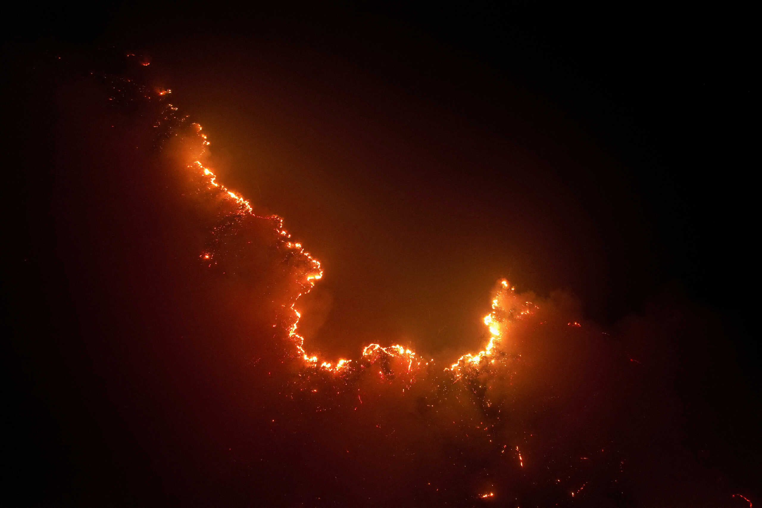 FILE PHOTO: A drone view shows a fire from burning vegetation in Amazon rainforest, in Apui, Amazonas state, Brazil, August 8, 2024. REUTERS