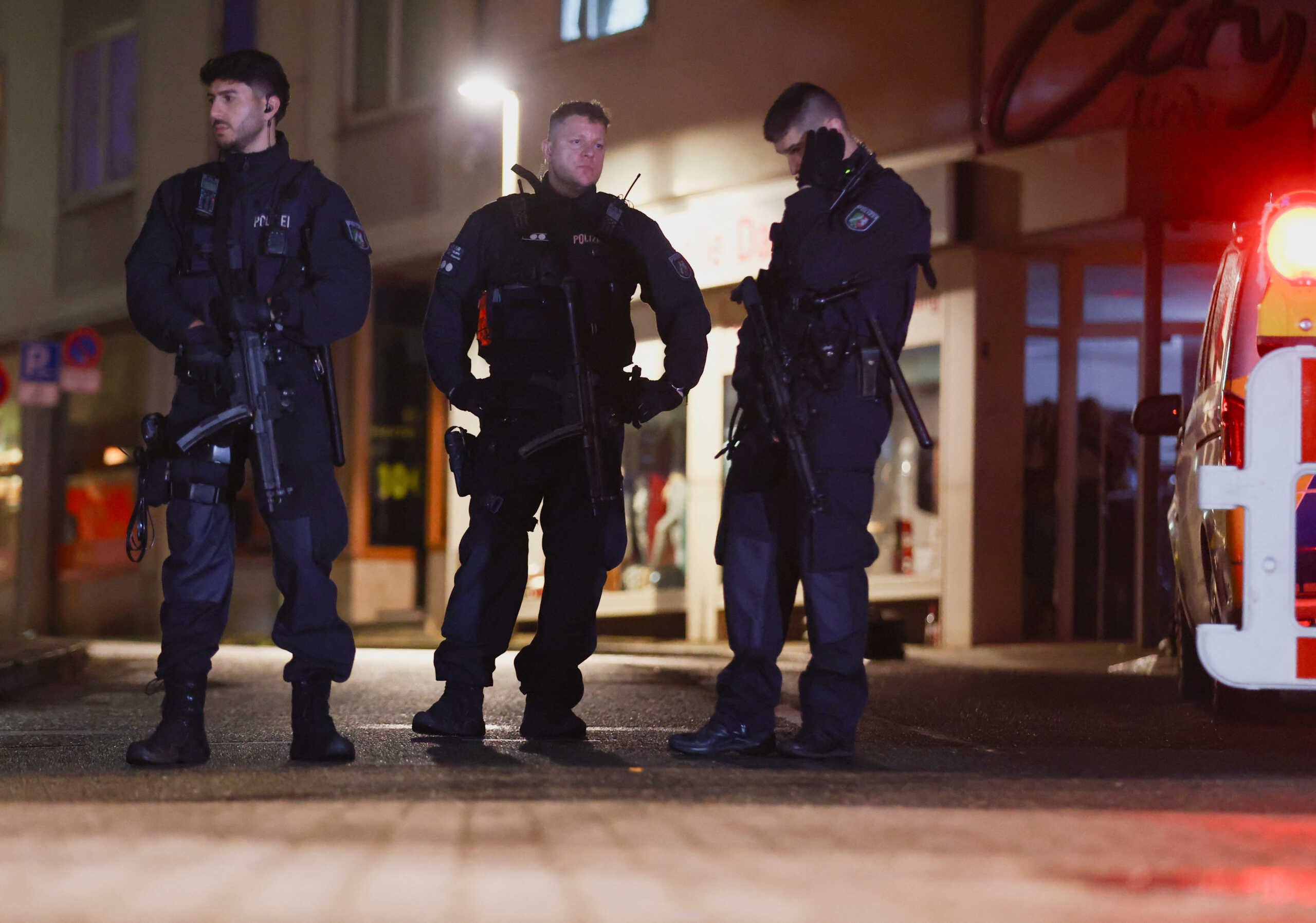 Police officers secure the area of an incident, after several individuals were killed on Friday night when a man randomly stabbed passers-by with a knife, at a city festival in Solingen, Germany, August 24, 2024. REUTERS
