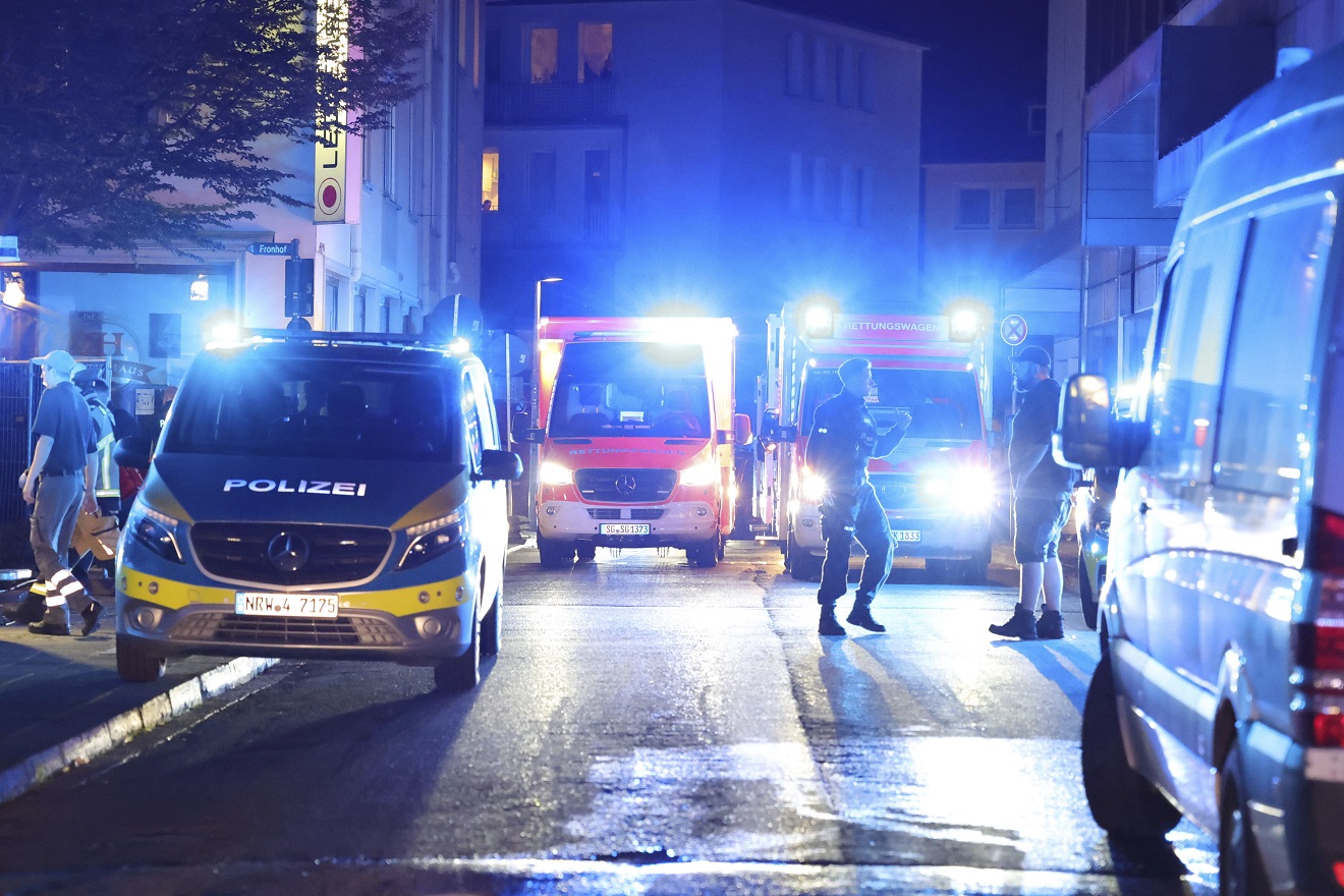 Police and ambulances near the scene where people were killed and injured in an attack at a festival in Solingen, western Germany, the German dpa news agency reported, Friday, Aug. 23, 2024. (Gianni Gattus