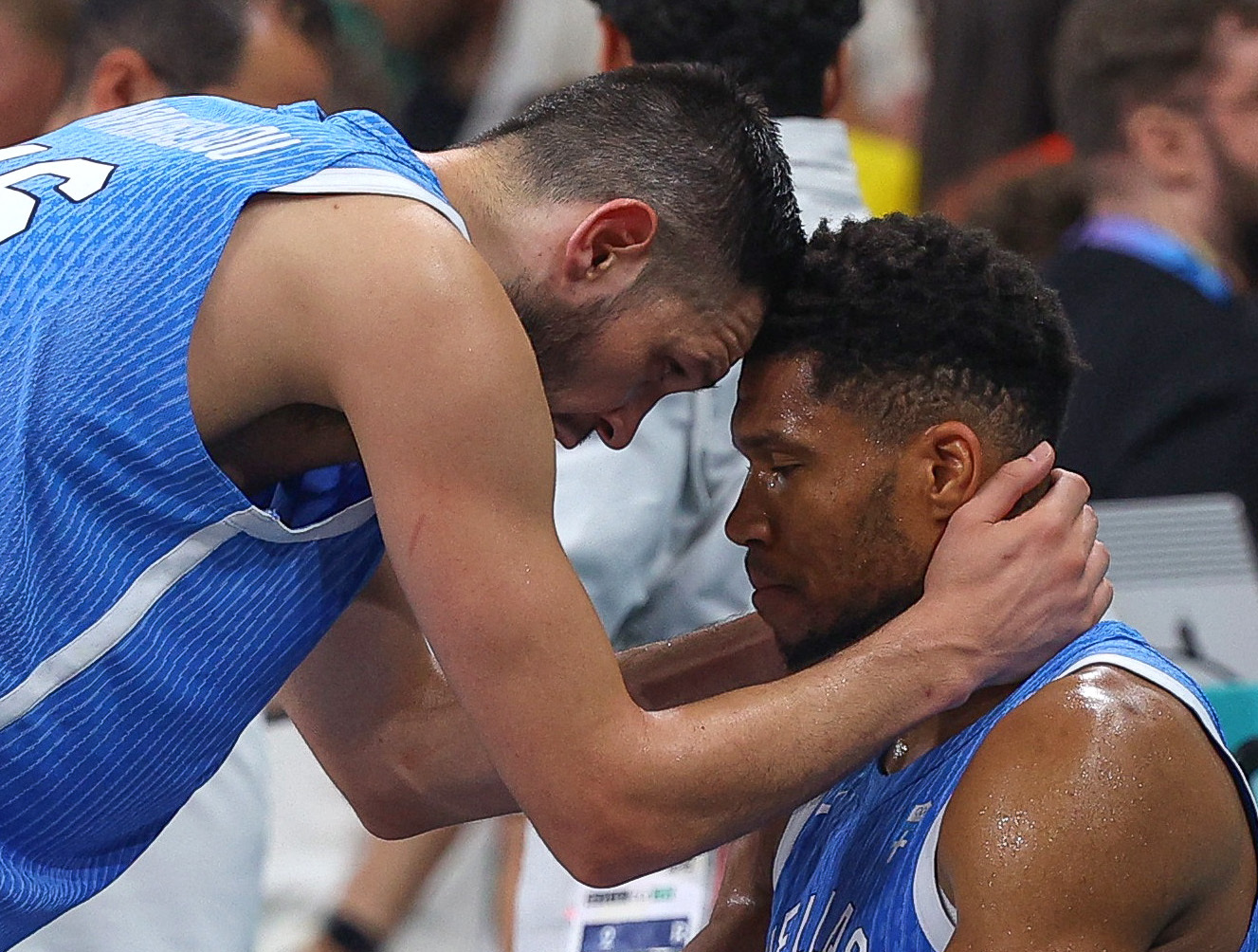 Paris 2024 Olympics - Basketball - Men's Group Phase - Group A - Australia vs Greece - Lille, Pierre Mauroy Stadium, Villeneve-d'Ascq, France - August 02, 2024. Giannis Antetokounmpo of Greece and Kostas Papanikolaou of Greece at the end of the match REUTERS