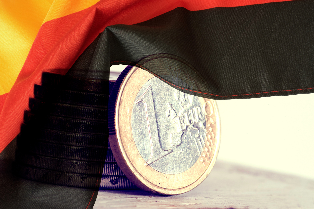 Flag of Germany and Euro coins