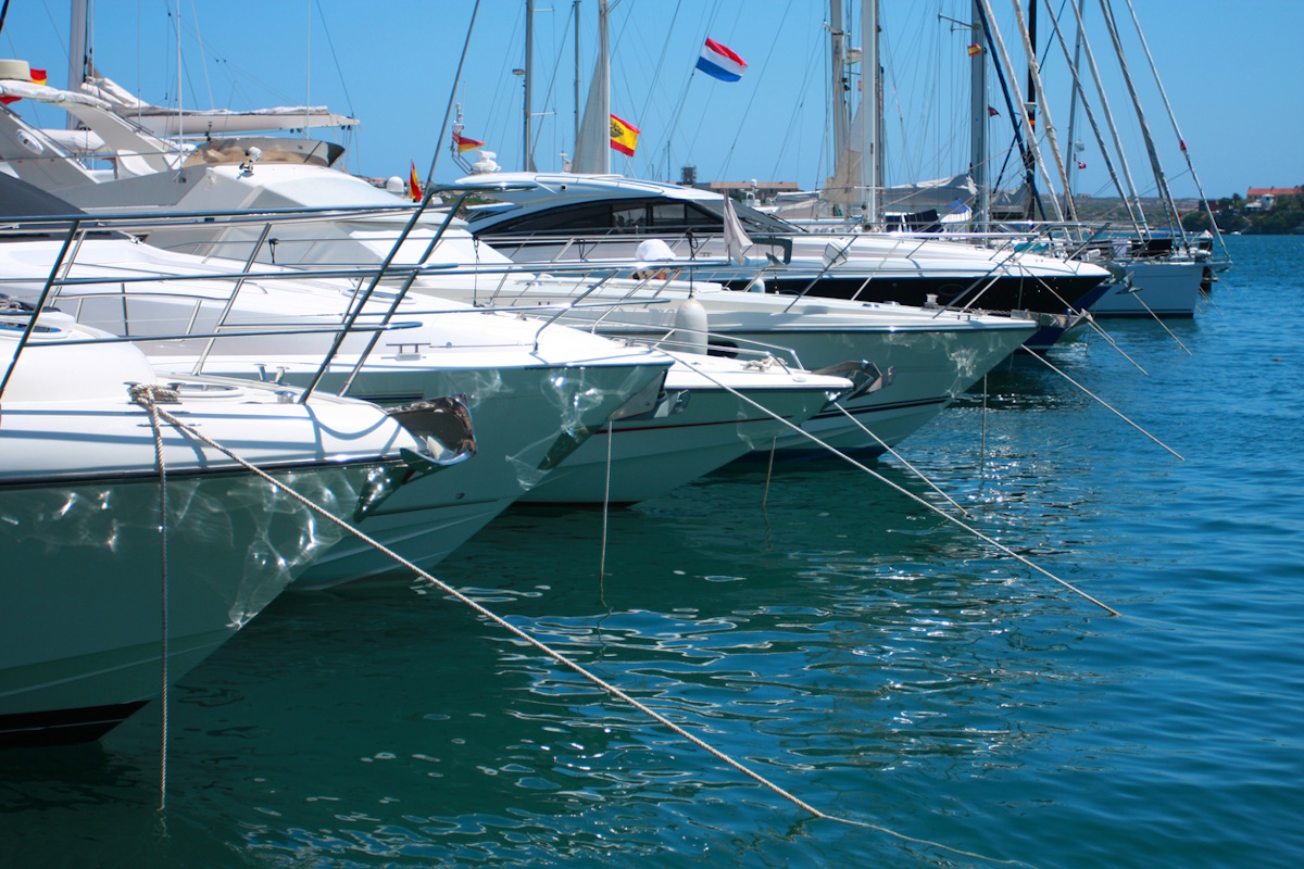 an assortment of boats in a marina