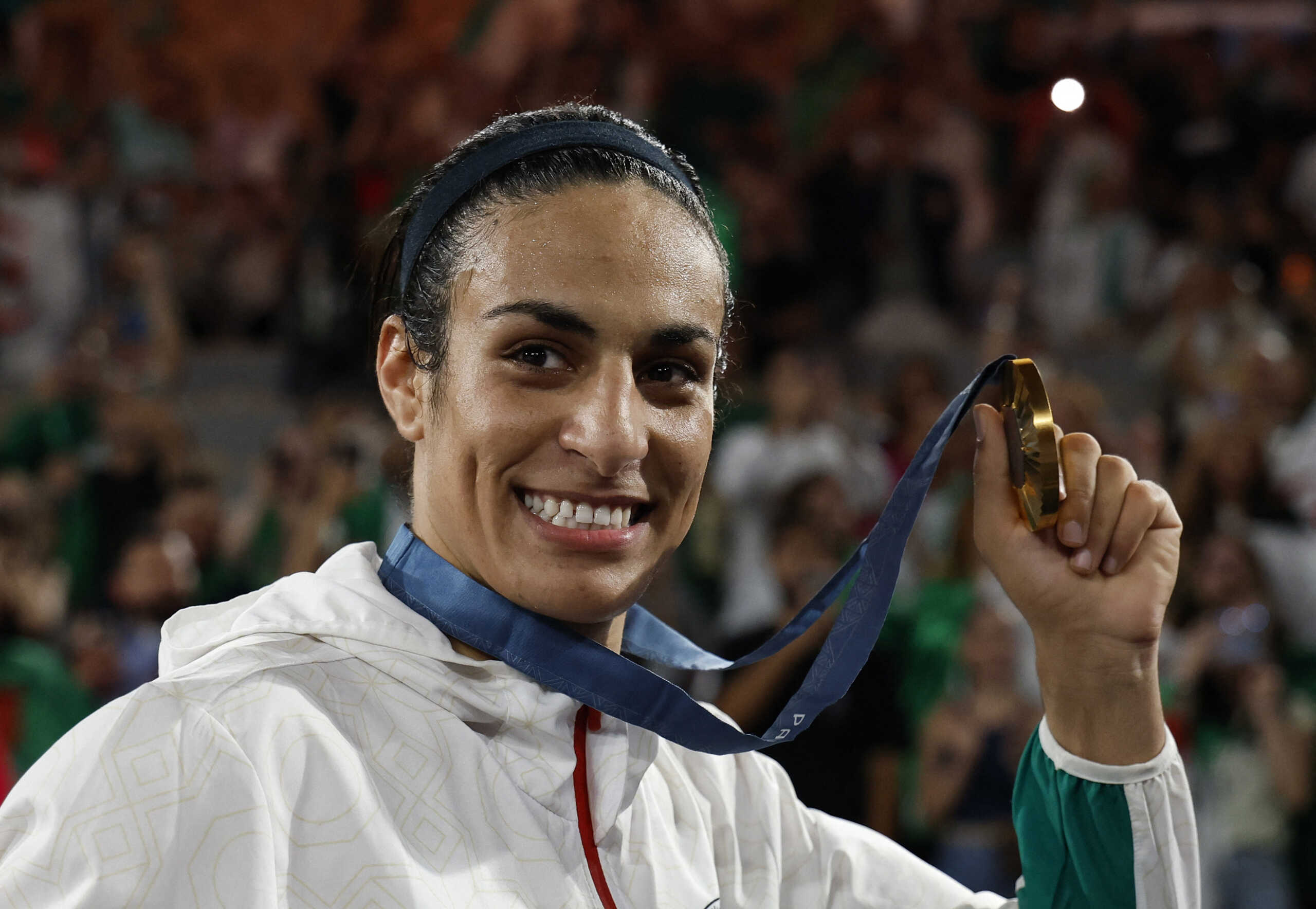 Paris 2024 Olympics - Boxing - Women's 66kg - Victory Ceremony - Roland-Garros Stadium, Paris, France - August 09, 2024. Gold medallist Imane Khelif of Algeria poses with her medal. REUTERS