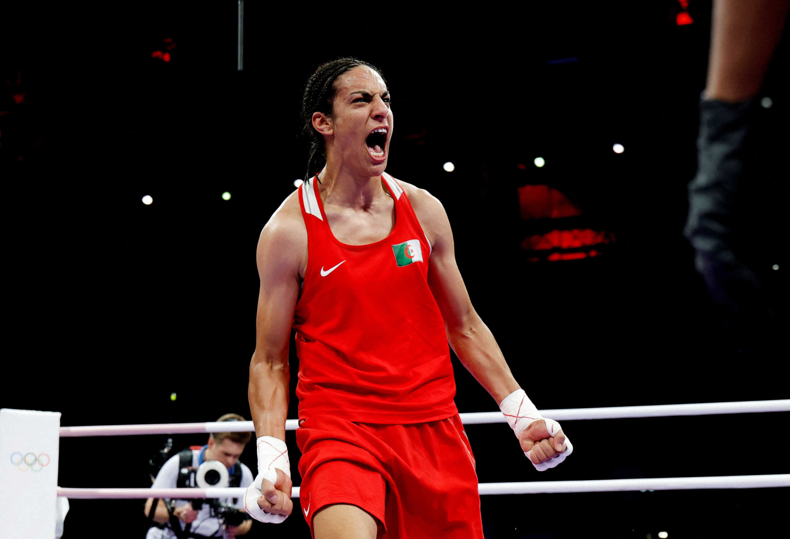 Paris 2024 Olympics - Boxing - Women's 66kg - Quarterfinal - North Paris Arena, Villepinte, France - August 03, 2024. Imane Khelif of Algeria celebrates after winning her fight against Anna Luca Hamori of Hungary. REUTERS