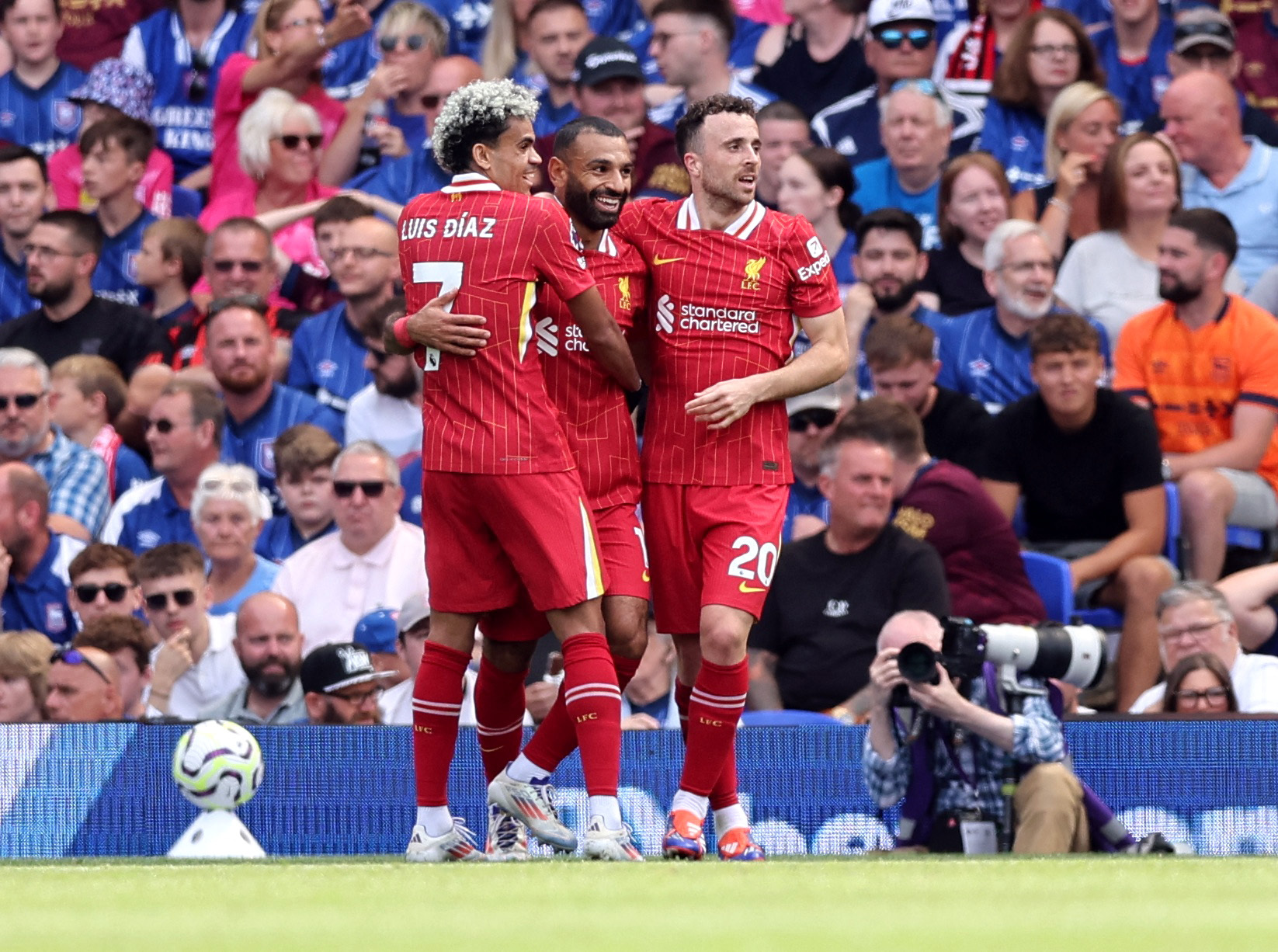 Soccer Football - Premier League - Ipswich Town v Liverpool - Portman Road, Ipswich, Britain - August 17, 2024 Liverpool's Mohamed Salah celebrates scoring their second goal with Luis Diaz and Diogo Jota REUTERS