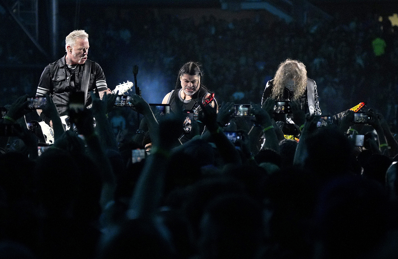 James Hetfield, from left, Robert Trujillo, and Kirk Hammett of Metallica perform at Soldier Field on Friday, Aug. 9, 2024, in Chicago, Ill. (Photo by Rob Grabowski