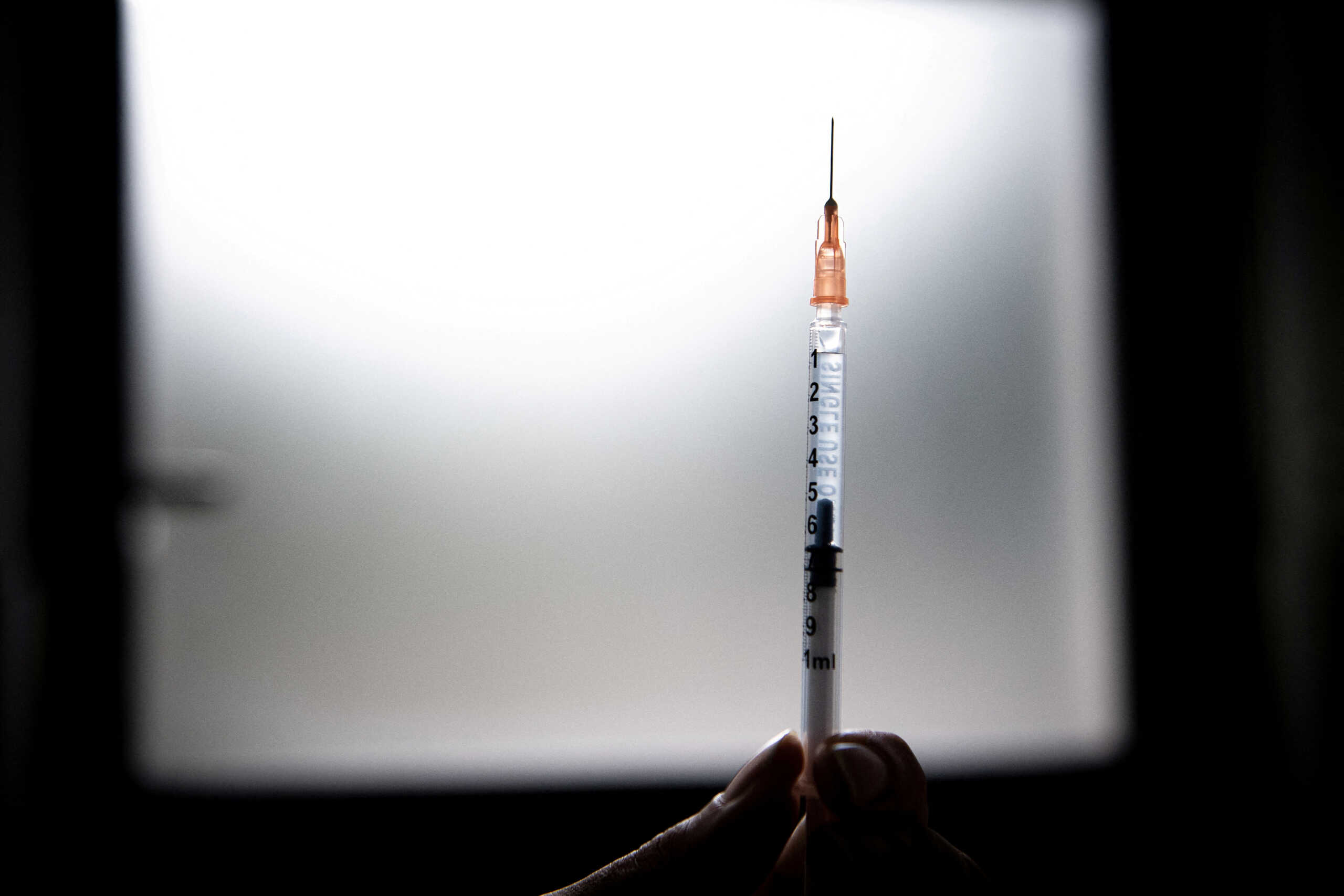 FILE PHOTO: A medical health worker prepares a dose of the mpox vaccine at the Edison municipal vaccination centre in Paris, France July 27, 2022. Alain Jocard