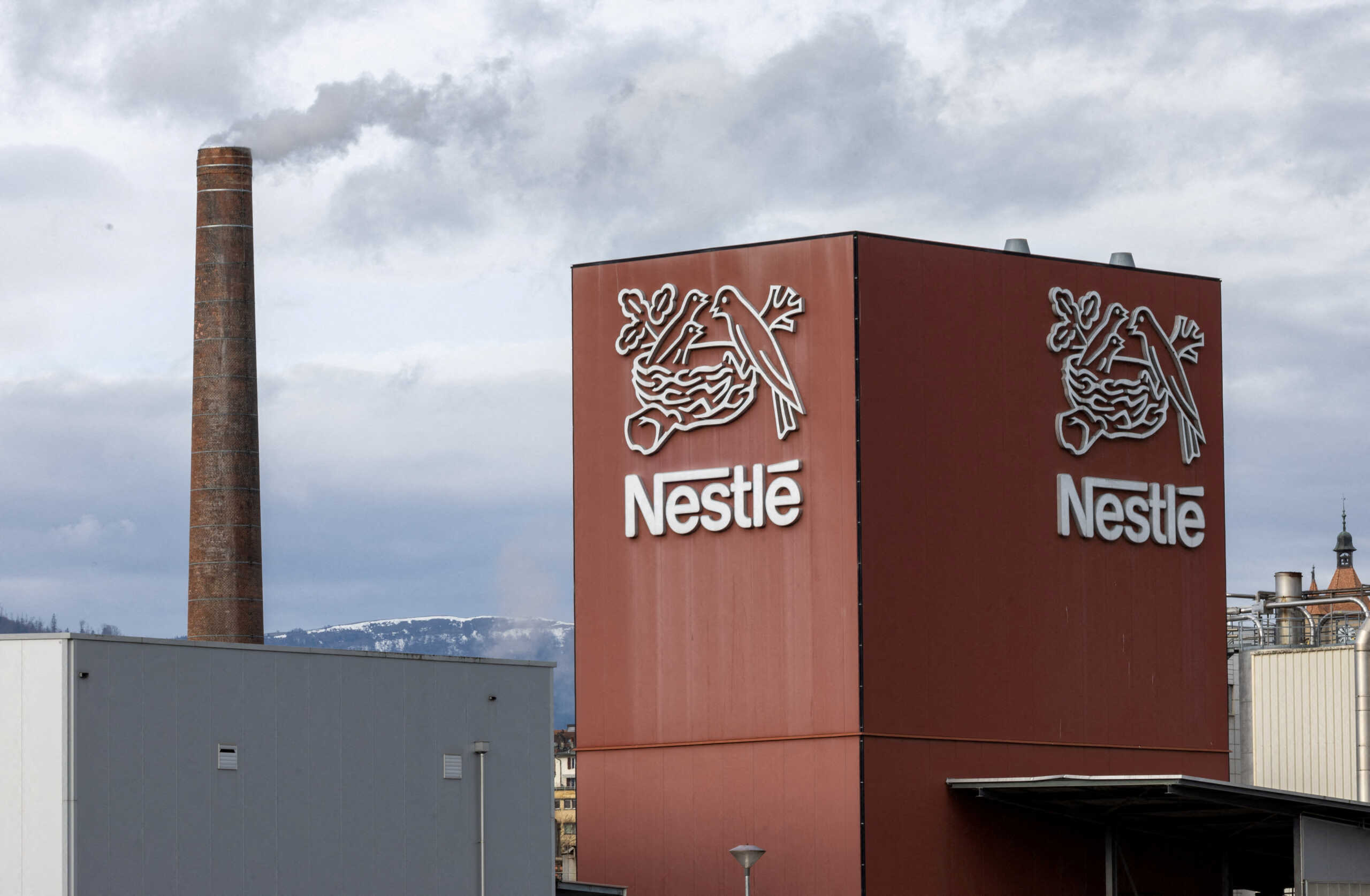 FILE PHOTO: A logo of food giant Nestle is seen in a building in Orbe, Switzerland, February 9, 2024. REUTERS