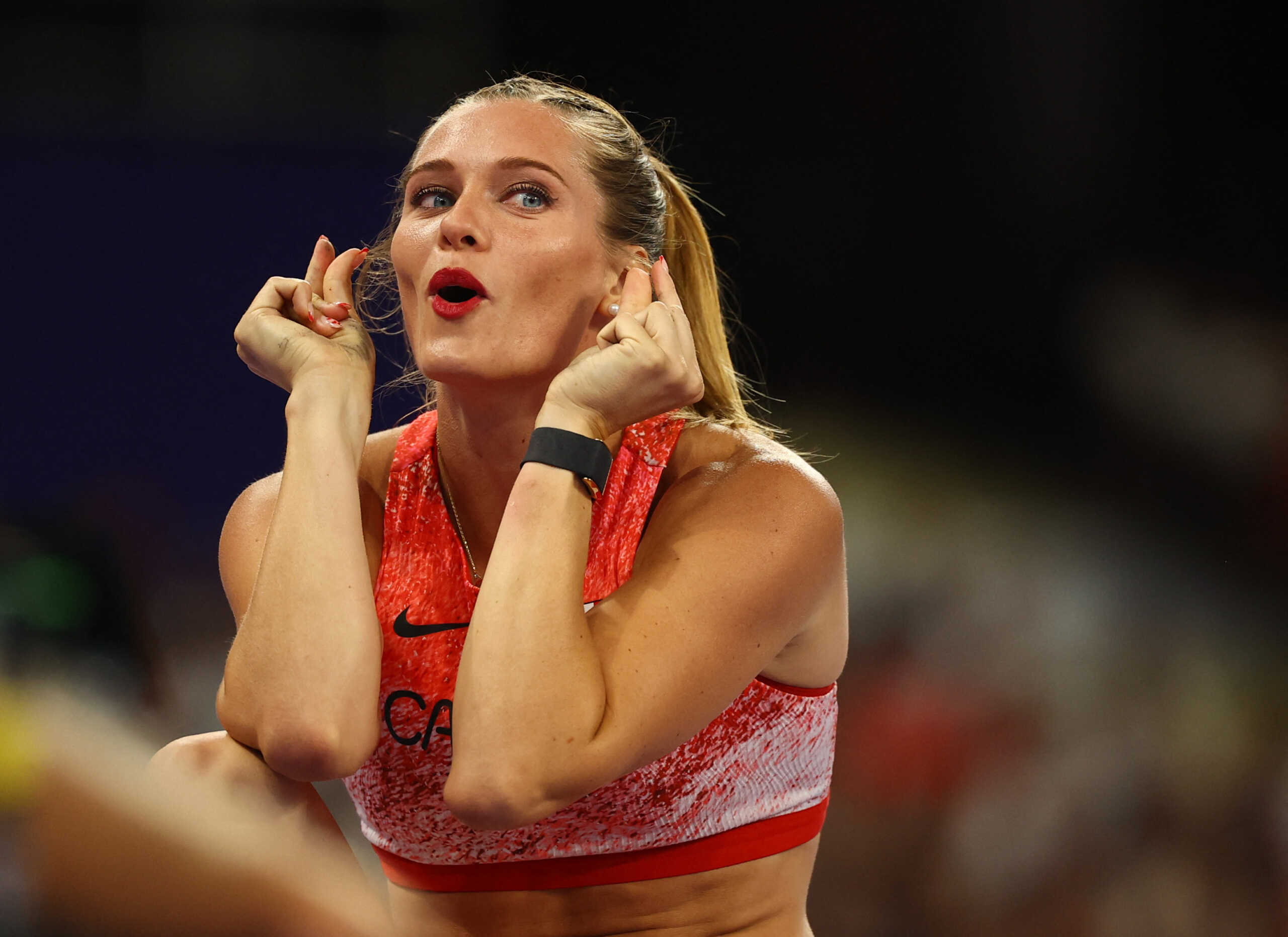 Paris 2024 Olympics - Athletics - Women's Pole Vault Final - Stade de France, Saint-Denis, France - August 07, 2024. Alysha Newman of Canada reacts after her vault REUTERS