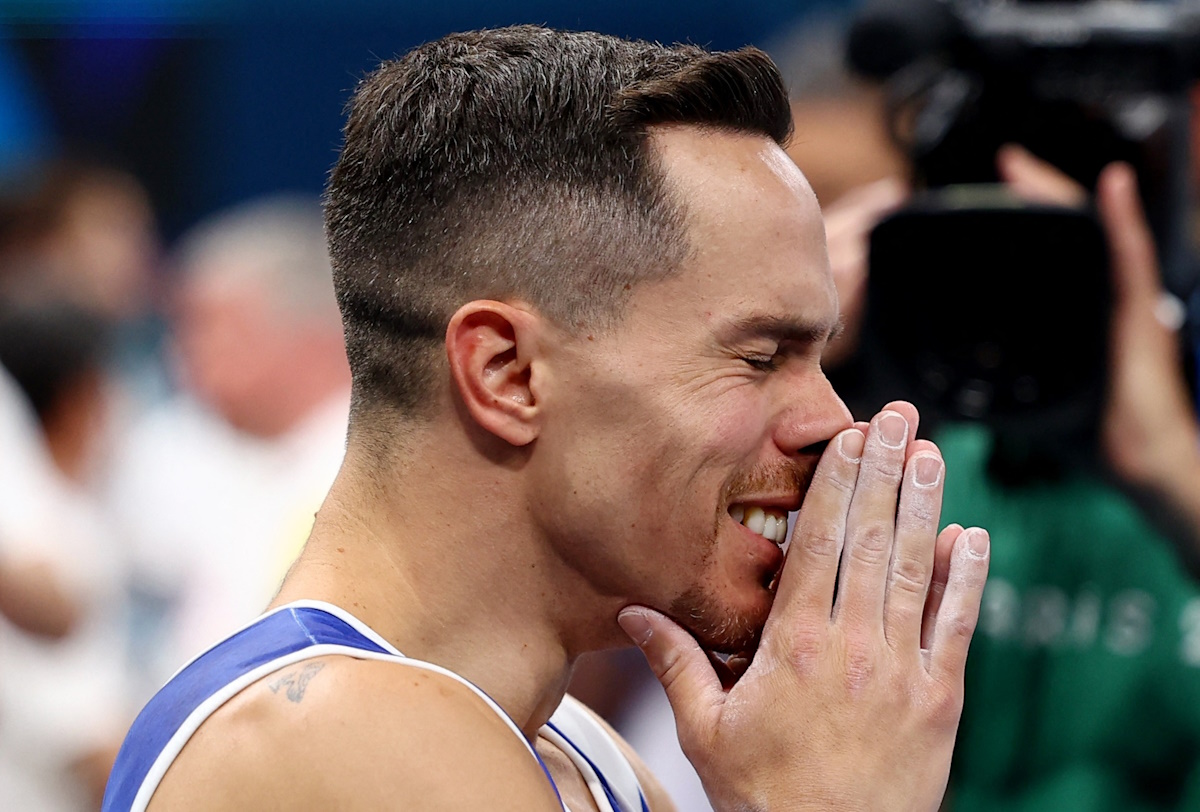 Paris 2024 Olympics - Artistic Gymnastics - Men's Rings Final - Bercy Arena, Paris, France - August 04, 2024. Eleftherios Petrounias of Greece celebrates after winning bronze. REUTERS