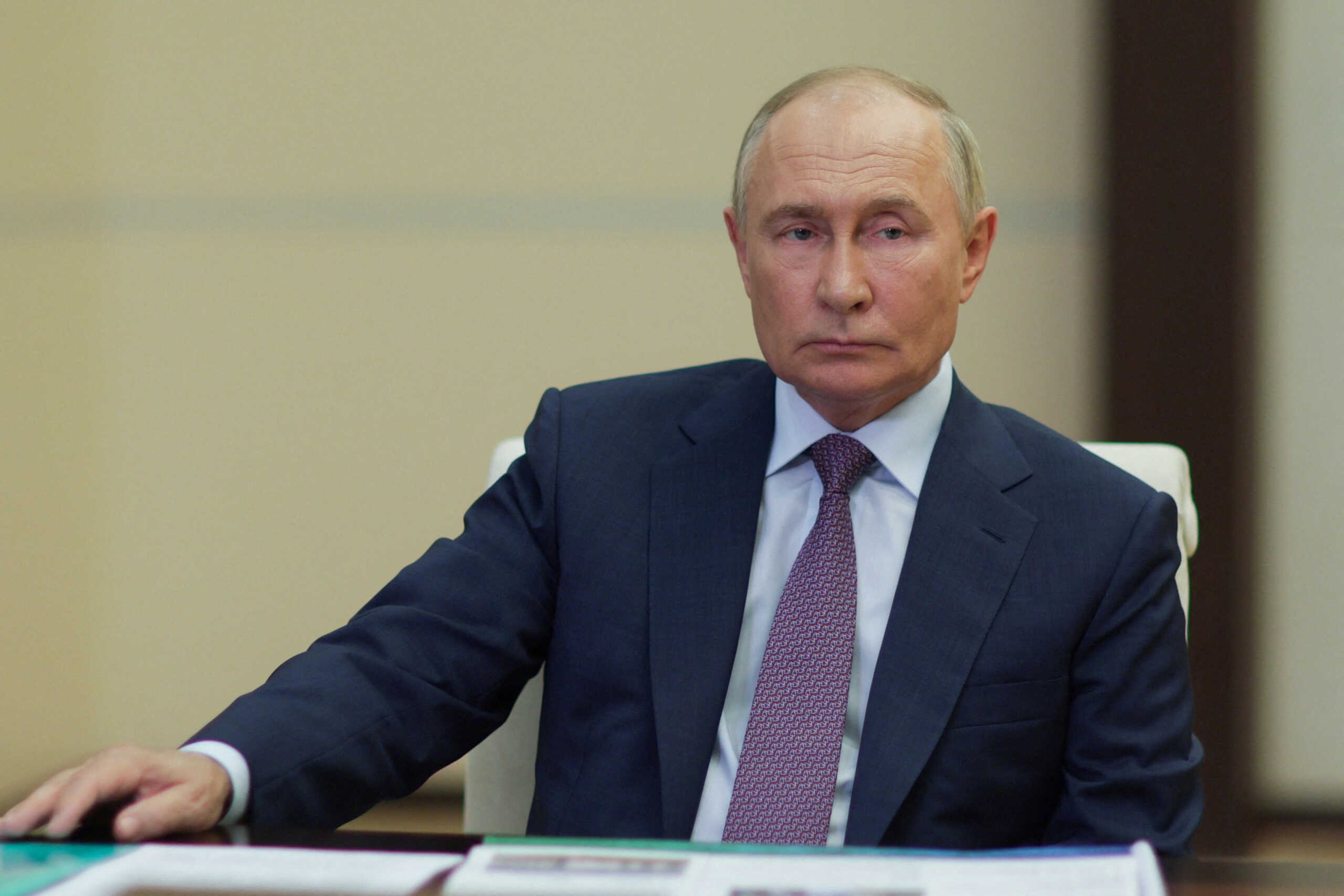 Russian President Vladimir Putin attends a meeting with acting governor of Kaliningrad Region Alexei Besprozvannykh at the Novo-Ogaryovo state residence outside Moscow, Russia August 14, 2024. Sputnik