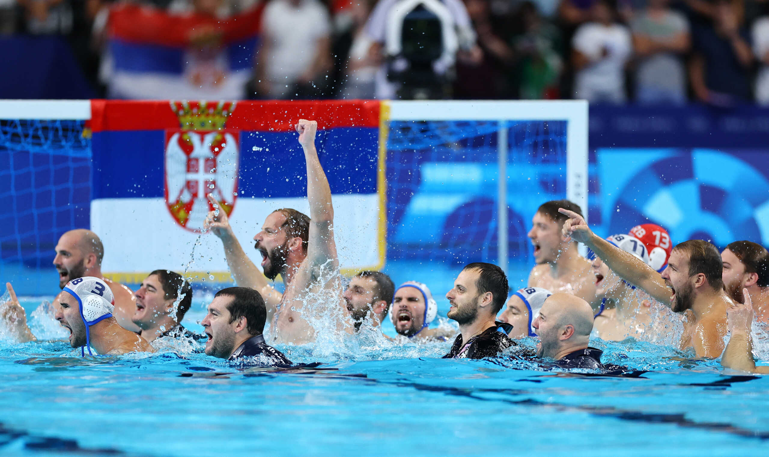 Paris 2024 Olympics - Water Polo - Men's Gold Medal Match - Serbia vs Croatia - Paris La Defense Arena, Nanterre, France - August 11, 2024. Team Serbia celebrates winning the game. REUTERS