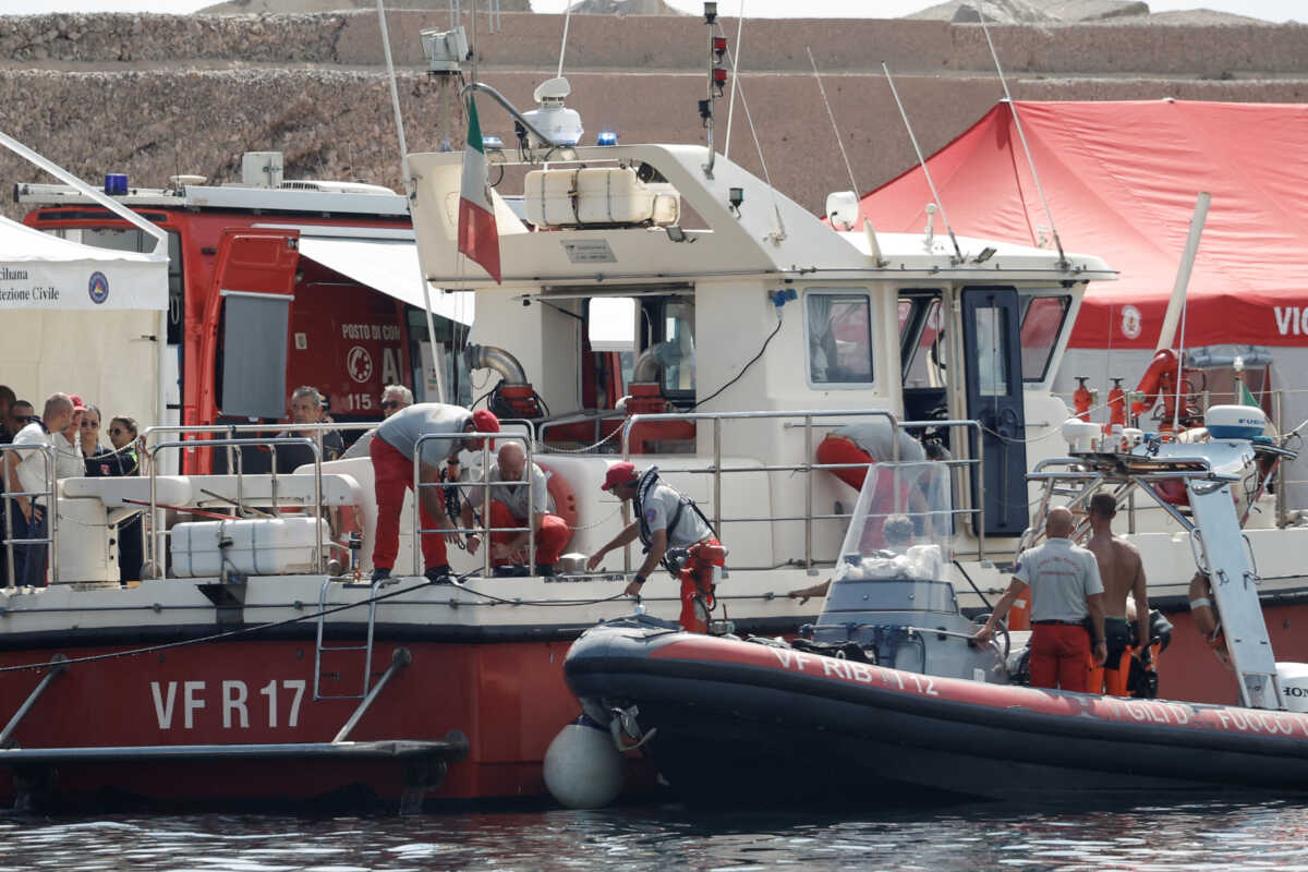 Rescue personnel work at the scene where a luxury yacht sank, off the coast of Porticello, near the Sicilian city of Palermo, Italy, August 22, 2024. REUTERS
