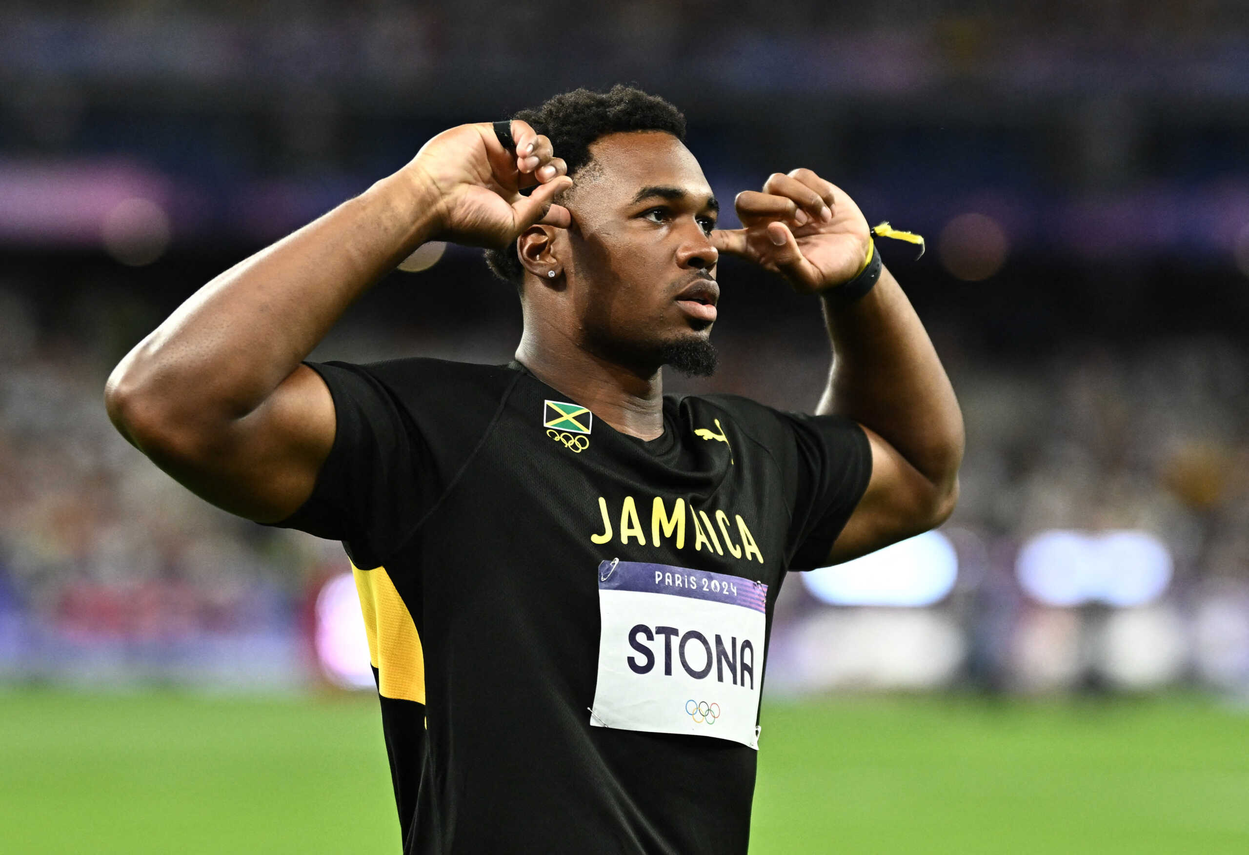 Paris 2024 Olympics - Athletics - Men's Discus Throw Final - Stade de France, Saint-Denis, France - August 07, 2024. Roje Stona of Jamaica celebrates after winning gold. REUTERS