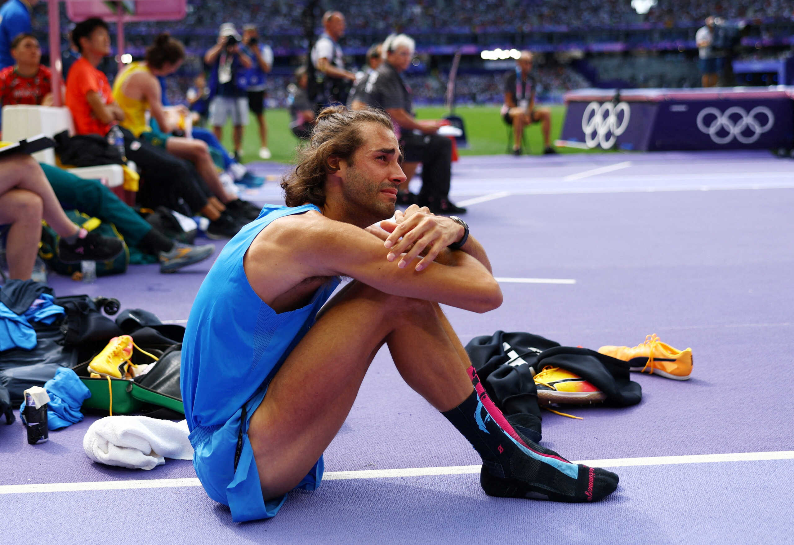 Paris 2024 Olympics - Athletics - Men's High Jump Qualification - Stade de France, Saint-Denis, France - August 07, 2024.  Gianmarco Tamberi of Italy reacts. REUTERS