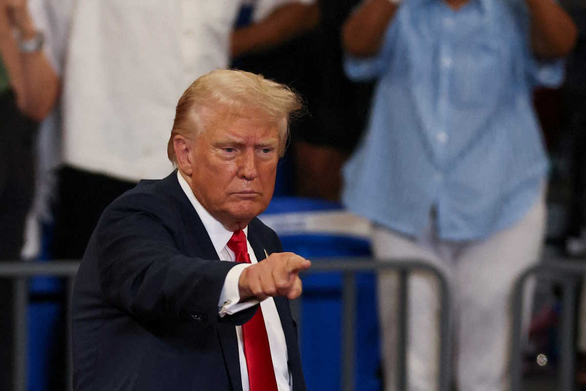 FILE PHOTO: Republican presidential nominee and former U.S. President Donald Trump gestures during a campaign rally held with Republican vice presidential nominee Senator JD Vance, in Atlanta, Georgia, U.S., August 3, 2024.  REUTERS