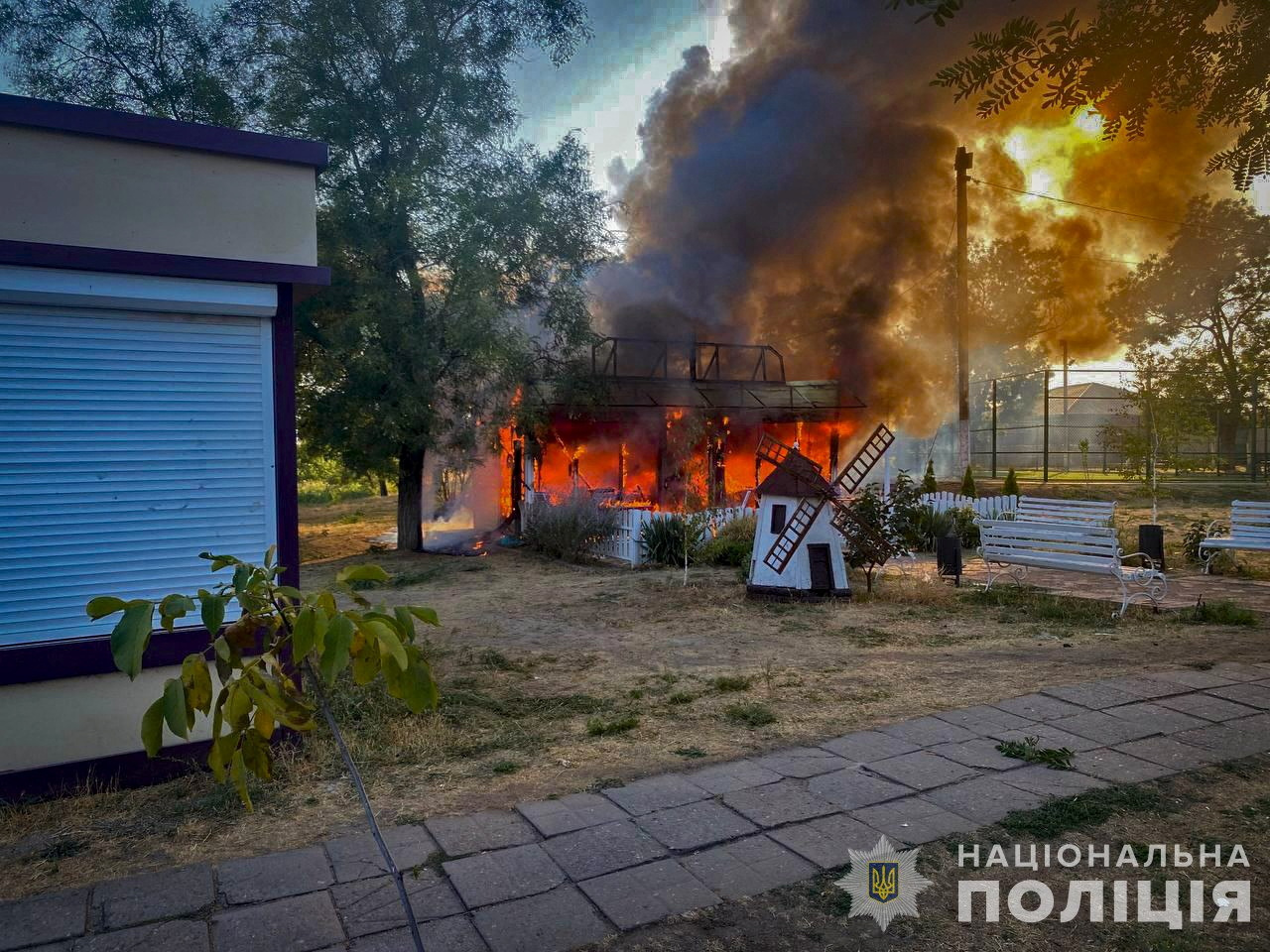 A view shows a burning children's cafe hit by a Russian military strike, amid Russia's attack on Ukraine, in the village of Malokaterynivka, Zaporizhzhia region, Ukraine August 20, 2024. National Police