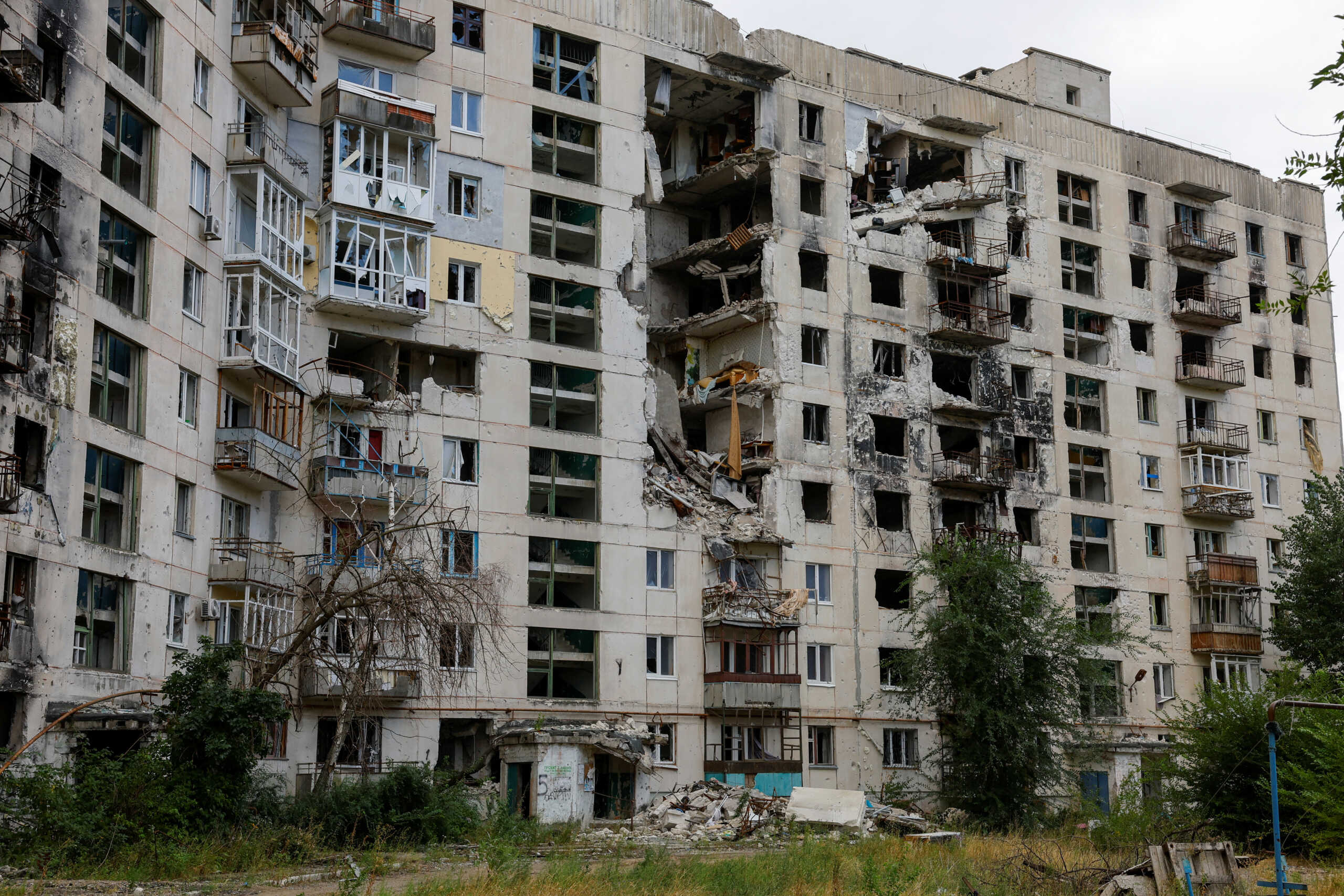 A view shows a multi-storey residential building destroyed in the course of Russia-Ukraine conflict in the town of Severodonetsk in the Luhansk region, Russian-controlled Ukraine August 8, 2024. REUTERS