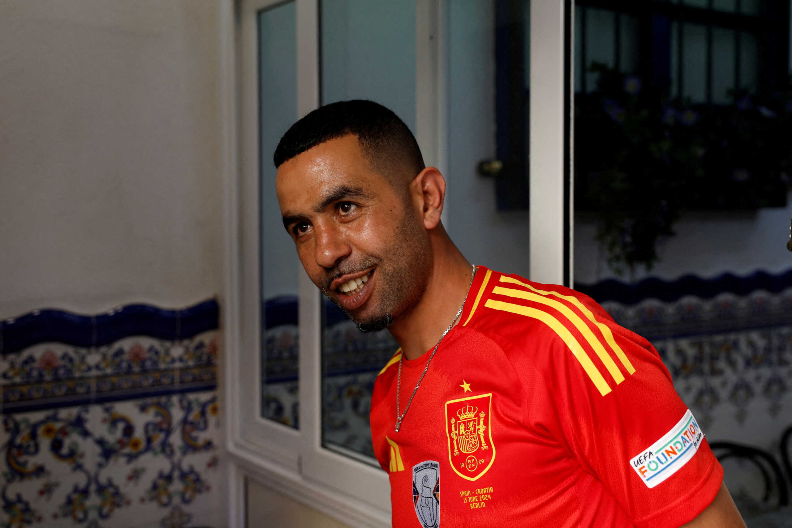 FILE PHOTO: Mounir Nasraoui, father of soccer player Lamine Yamal, smiles in Bar El Cordobes at Rocafonda neighbourhood in Mataro, north of Barcelona, Spain, July 11, 2024. REUTERS