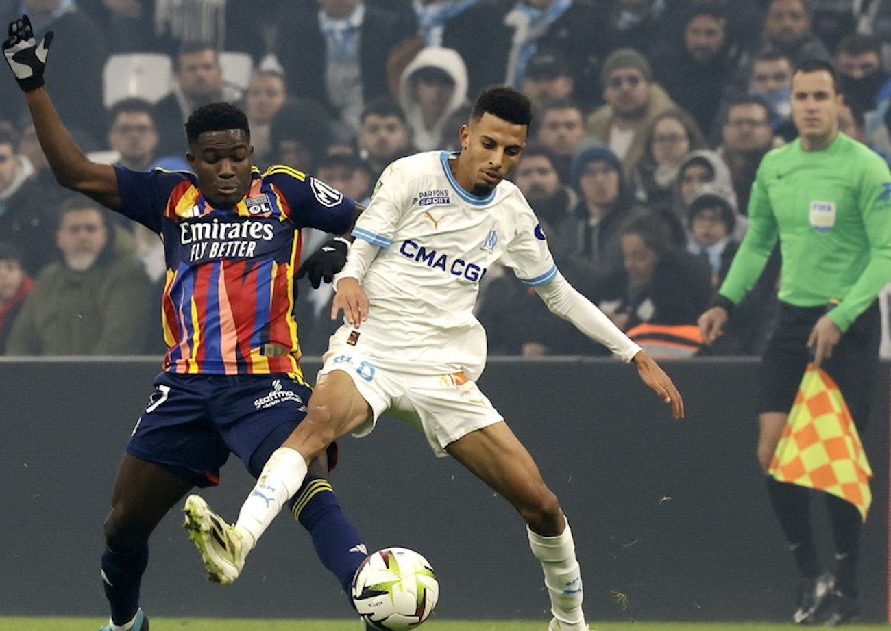 epa11014532 Azzedine Ounahi (R) of Olympique Marseille and Ernest Nuamah (L) of Olympique Lyon in action during the French Ligue 1 soccer match between Olympique Marseille and Olympique Lyon, in Marseille, southern France, 06 December 2023.  EPA