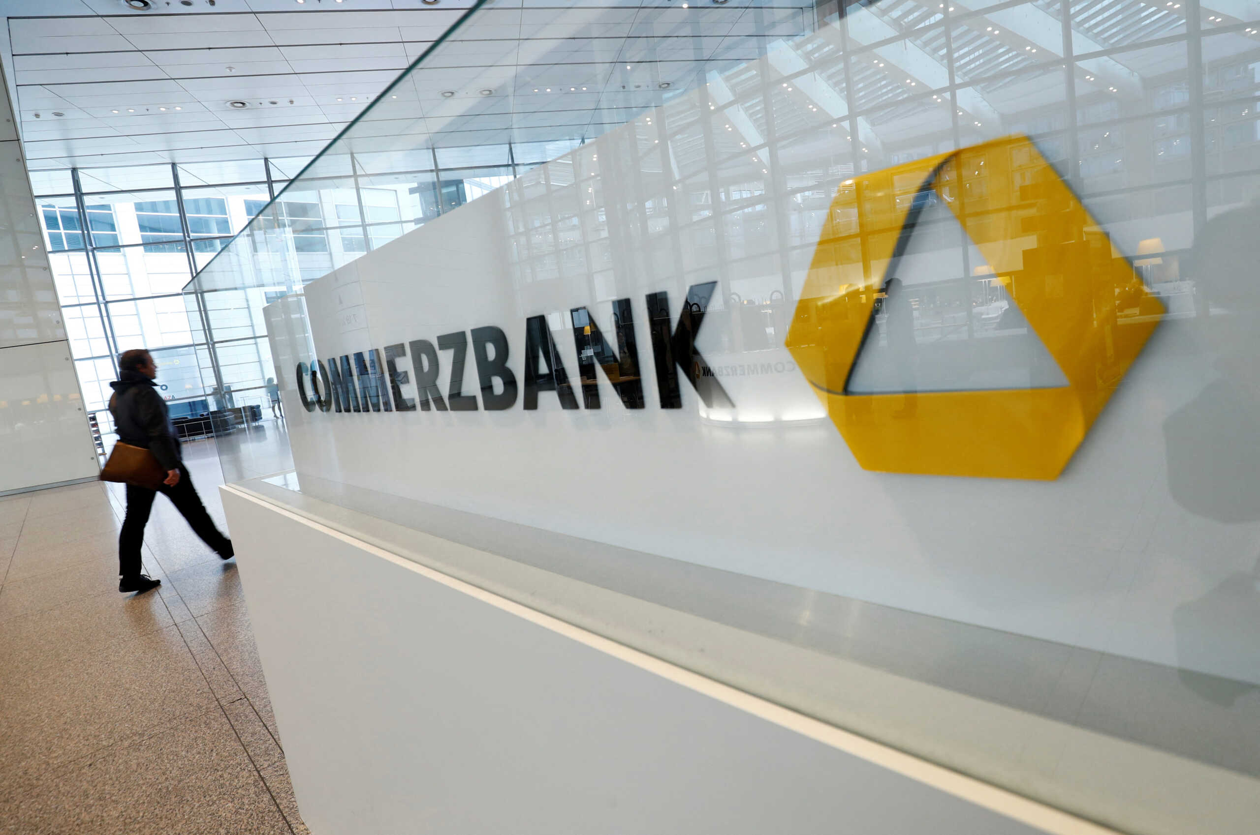 FILE PHOTO: A company logo is pictured at the headquarters of Germany's Commerzbank AG during the annual results news conference in Frankfurt, Germany, February 13, 2020.  REUTERS