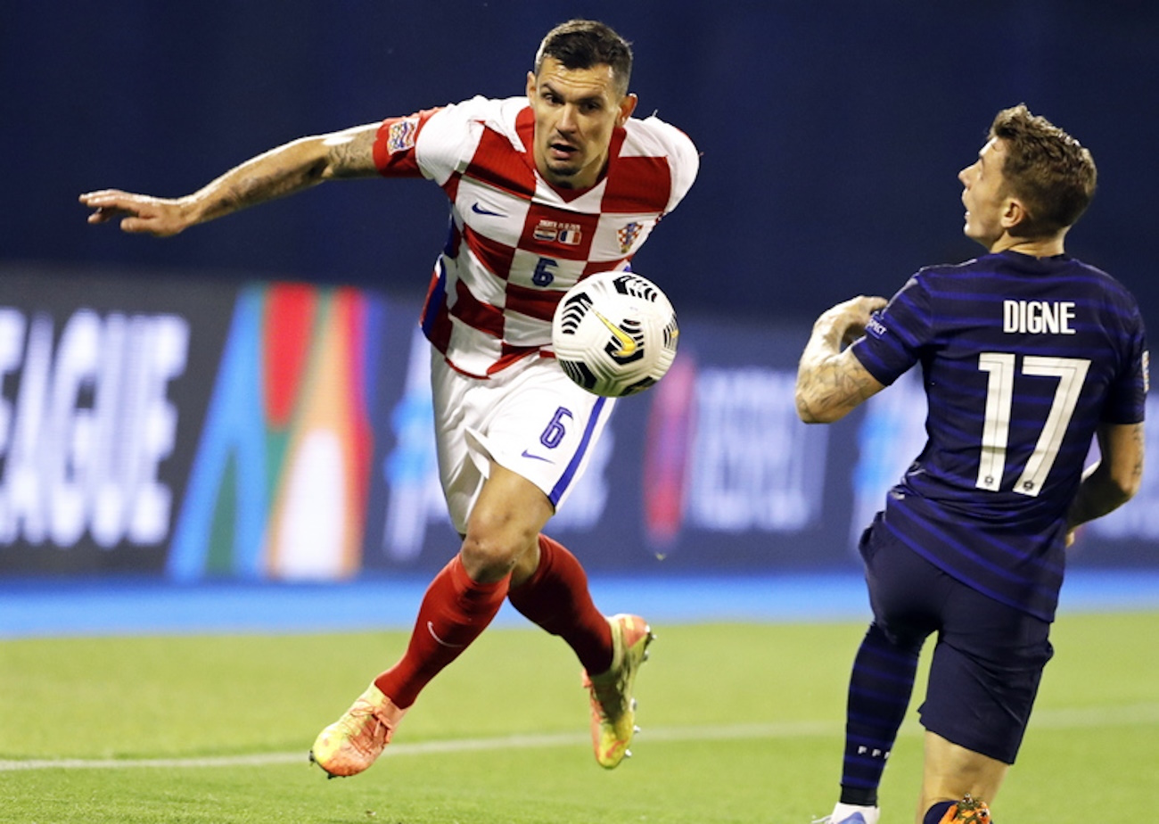 epa08745399 Croatia's Dejan Lovren (L) in action against France's Lucas Digne (R) during the UEFA Nations League soccer match between Croatia and France in Zagreb, Croatia, 14 October 2020.  EPA