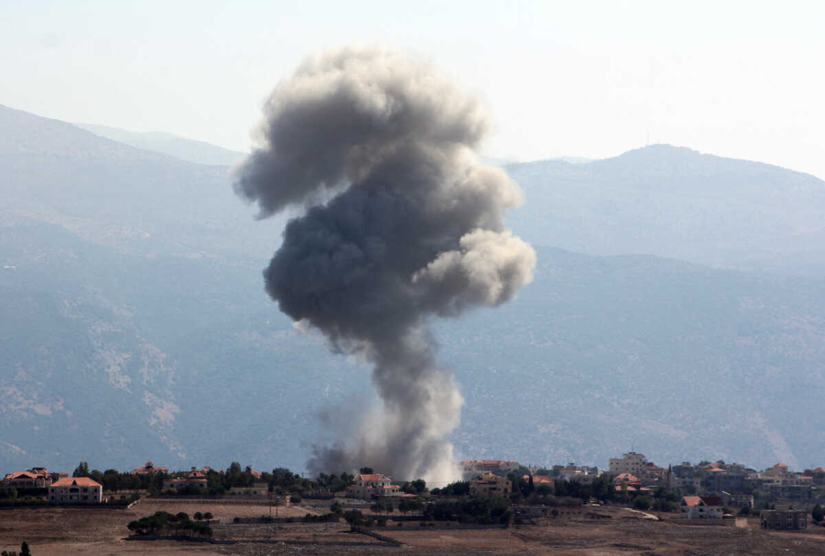 Smoke billows over Khiam, amid ongoing cross-border hostilities between Hezbollah and Israeli forces, as pictured from Marjayoun, near the Lebanese border with Israel, September 30, 2024. REUTERS