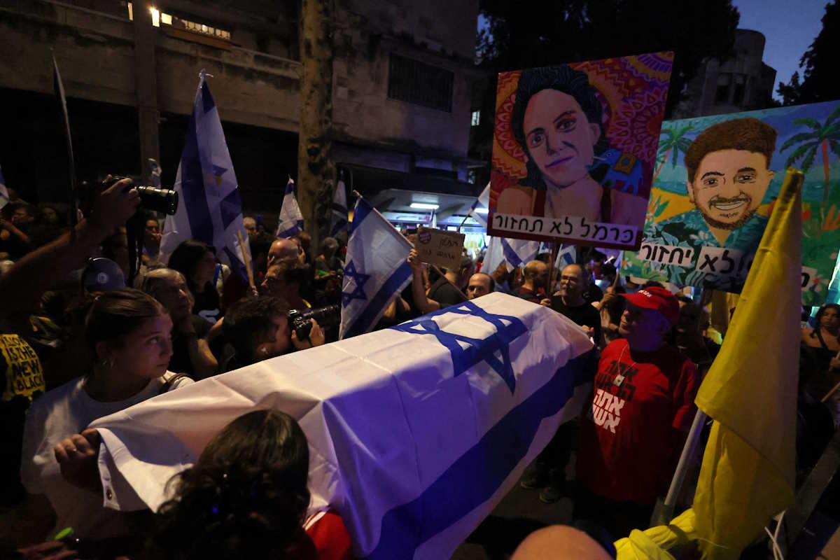 People attend a demonstration calling for the immediate return of hostages held in Gaza, amid the ongoing conflict between Israel and Hamas, near Israeli Prime Minister Benjamin Netanyahu's residence in Jerusalem, September 2, 2024. REUTERS
