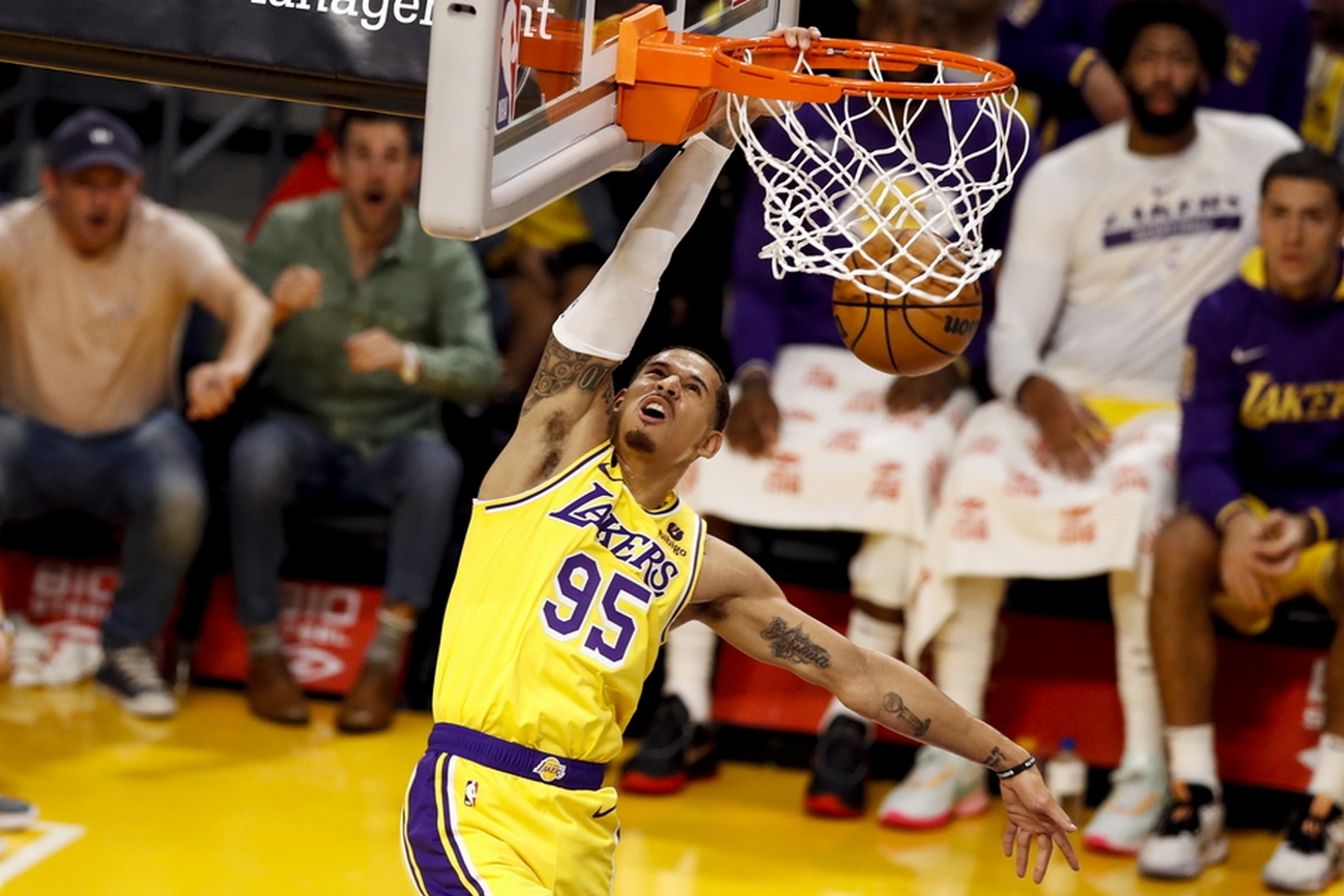 epa10222046 Los Angeles Lakers forward Juan Toscano-Anderson scores during the first quarter of the pre-season NBA basketball game between the Los Angeles Lakers and the Sacramento Kings at the Crypto.com Arena in Los Angeles, California, USA, 03 October 2022.  EPA